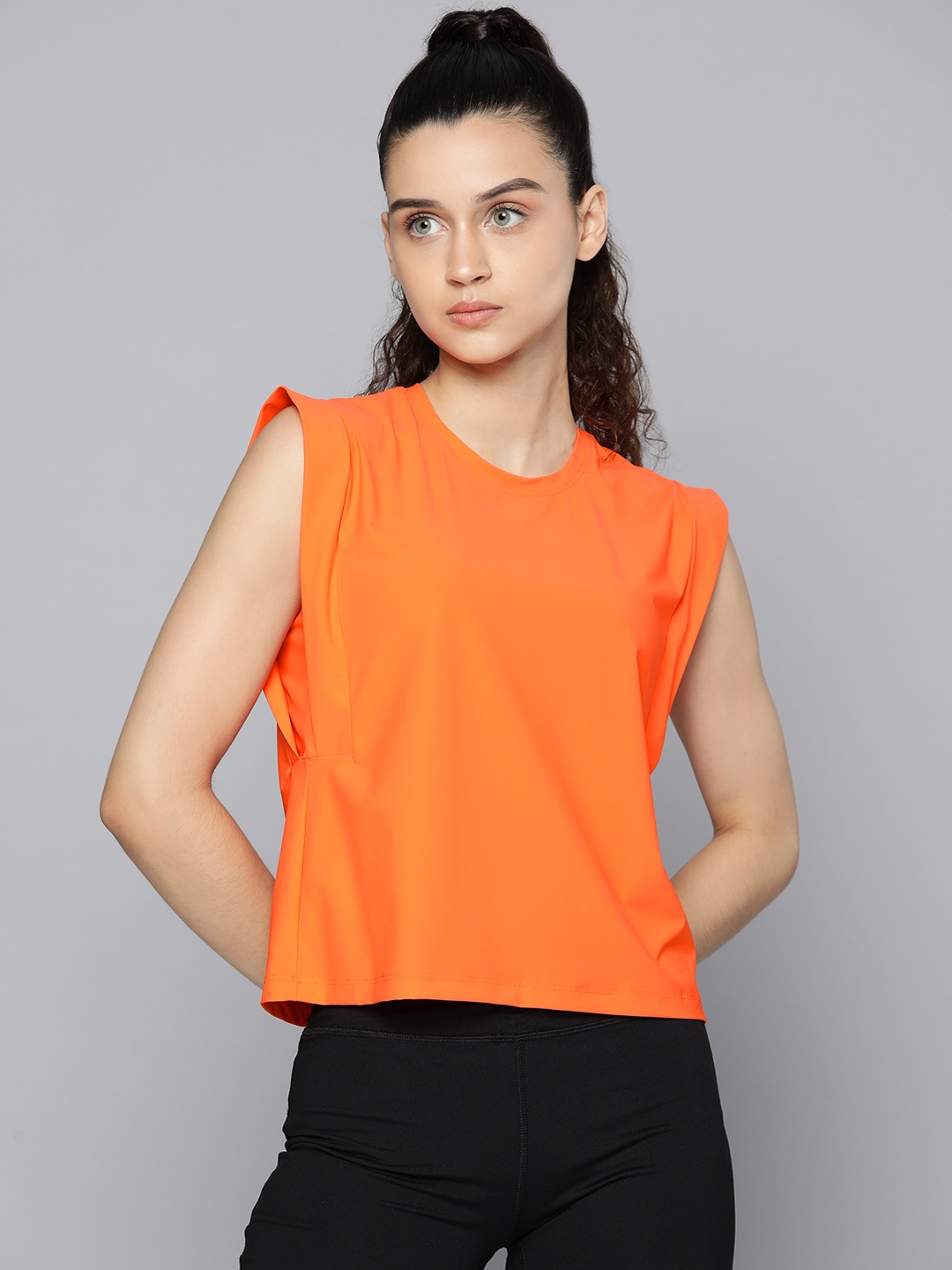

Fitkin Women Orange Solid T-shirt