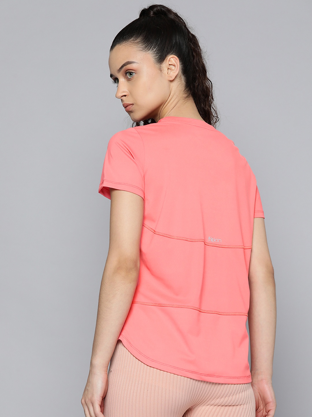 

Fitkin Women Coral Pink Solid T-shirt