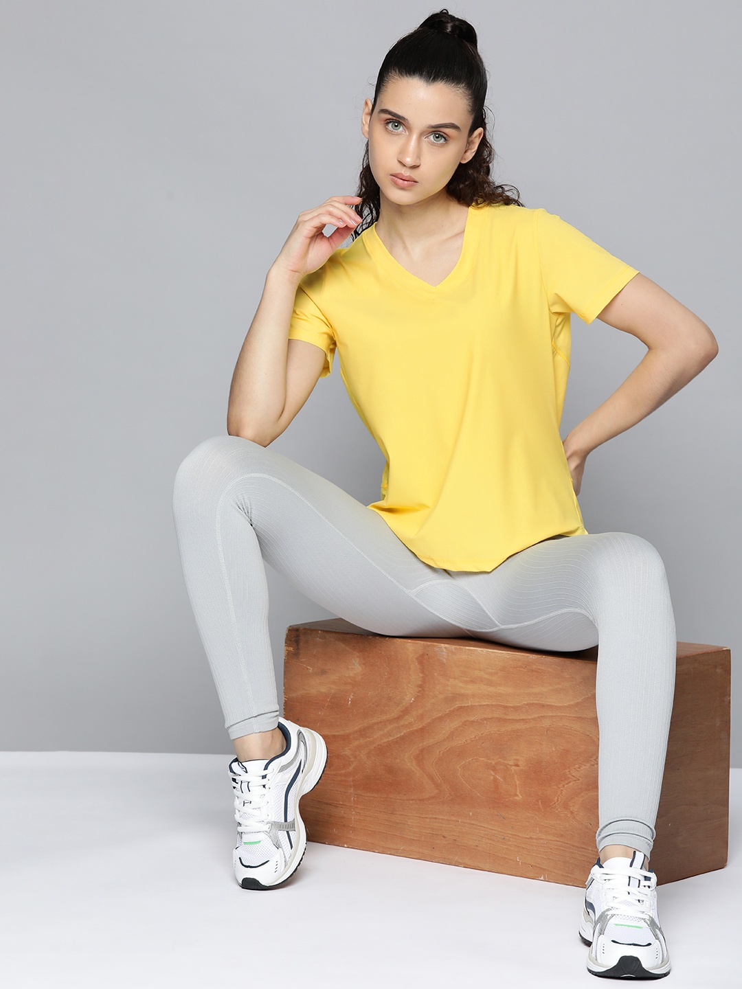 

Fitkin Women Yellow Solid T-shirt