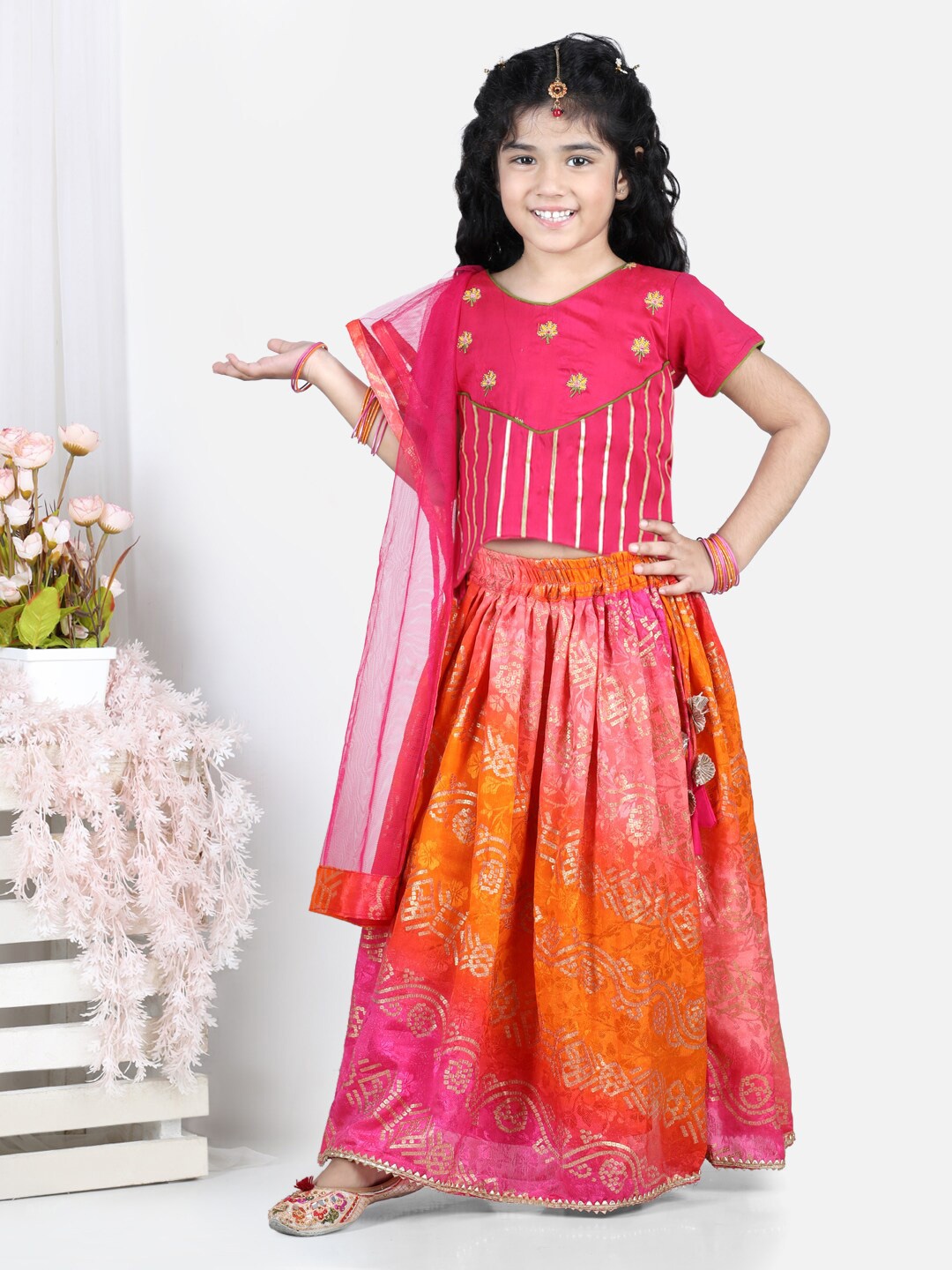 

Here&Now X Kinder Kids Girls Pink & Orange Embroidered Thread Work Ready to Wear Lehenga & Blouse With Dupatta