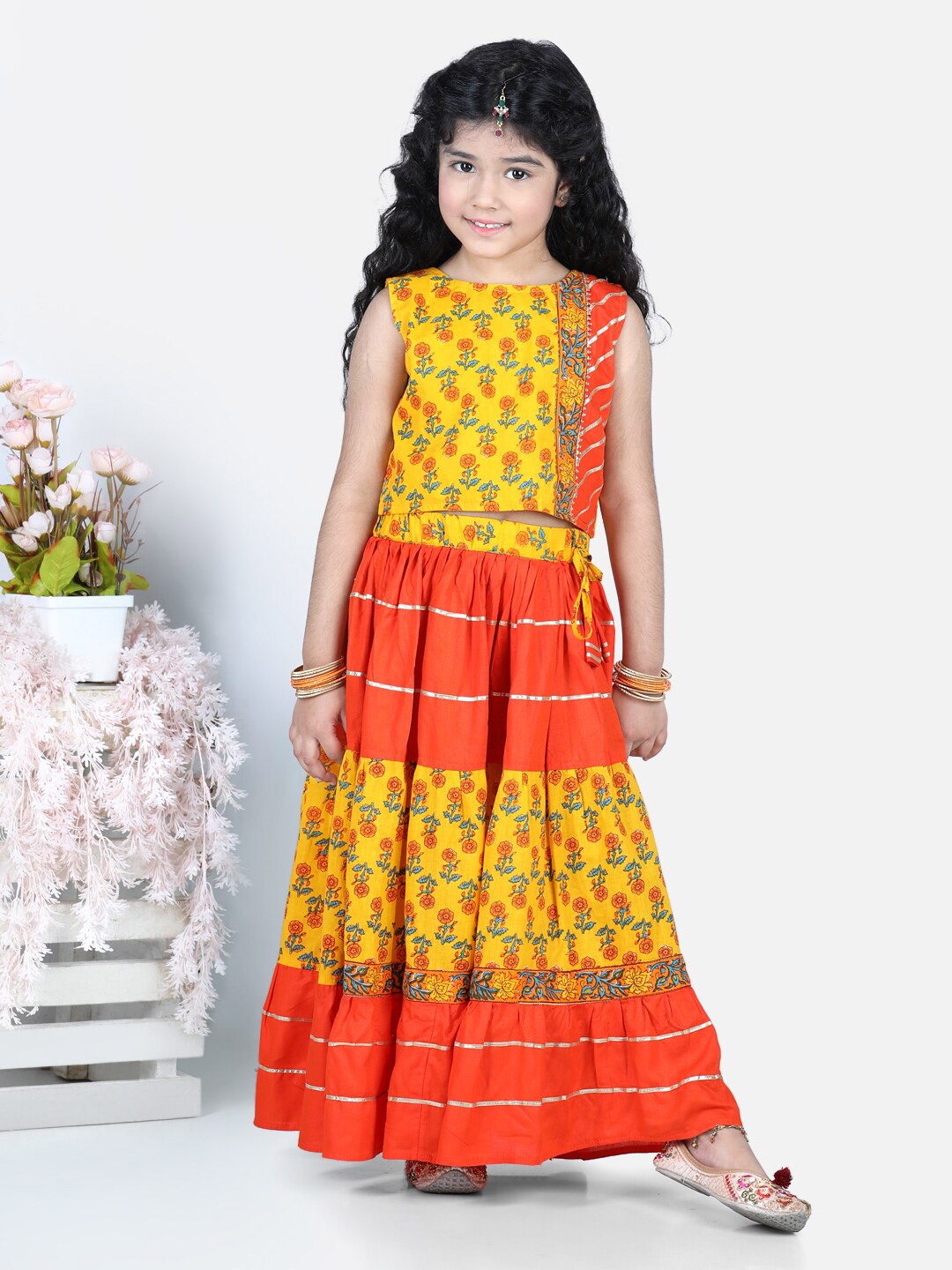 

Here&Now X Kinder Kids Girls Yellow & Orange Printed Ready to Wear Lehenga Choli