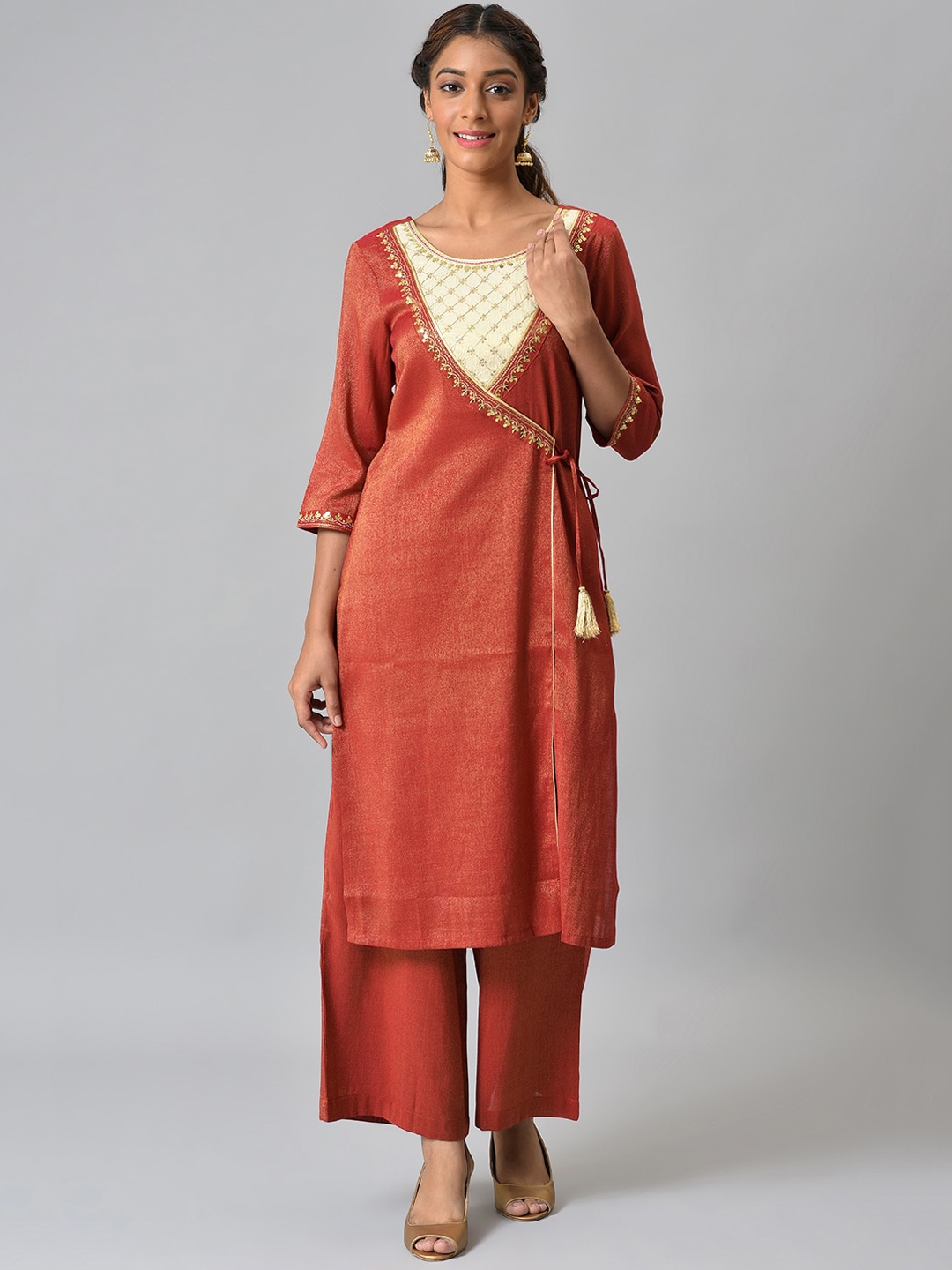 

AURELIA Women Rust Ethnic Motifs Embroidered Angrakha Kurta with Palazzos