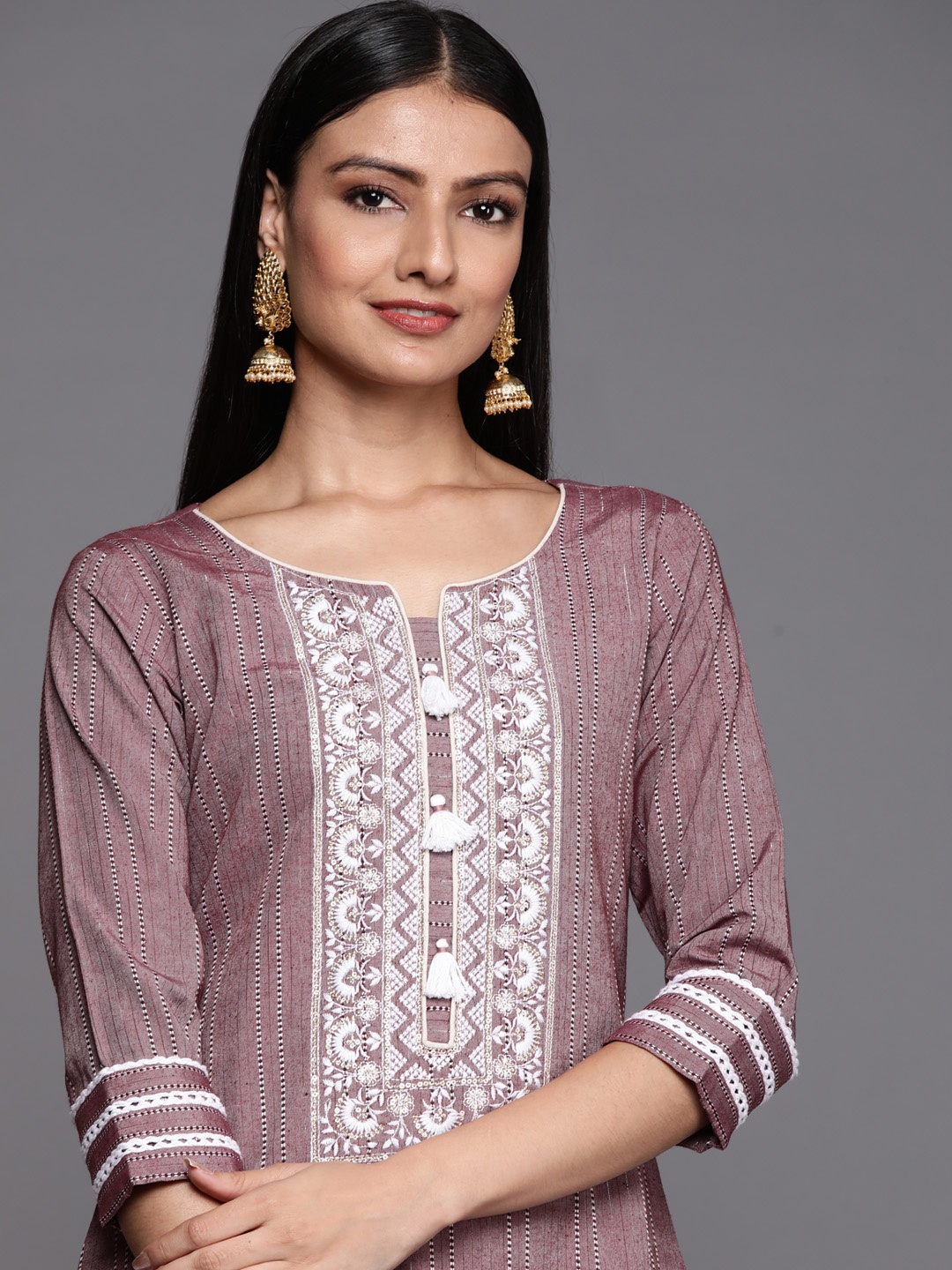 

Libas Women Mauve & White Ethnic Motifs Embroidered Thread Work Kurta