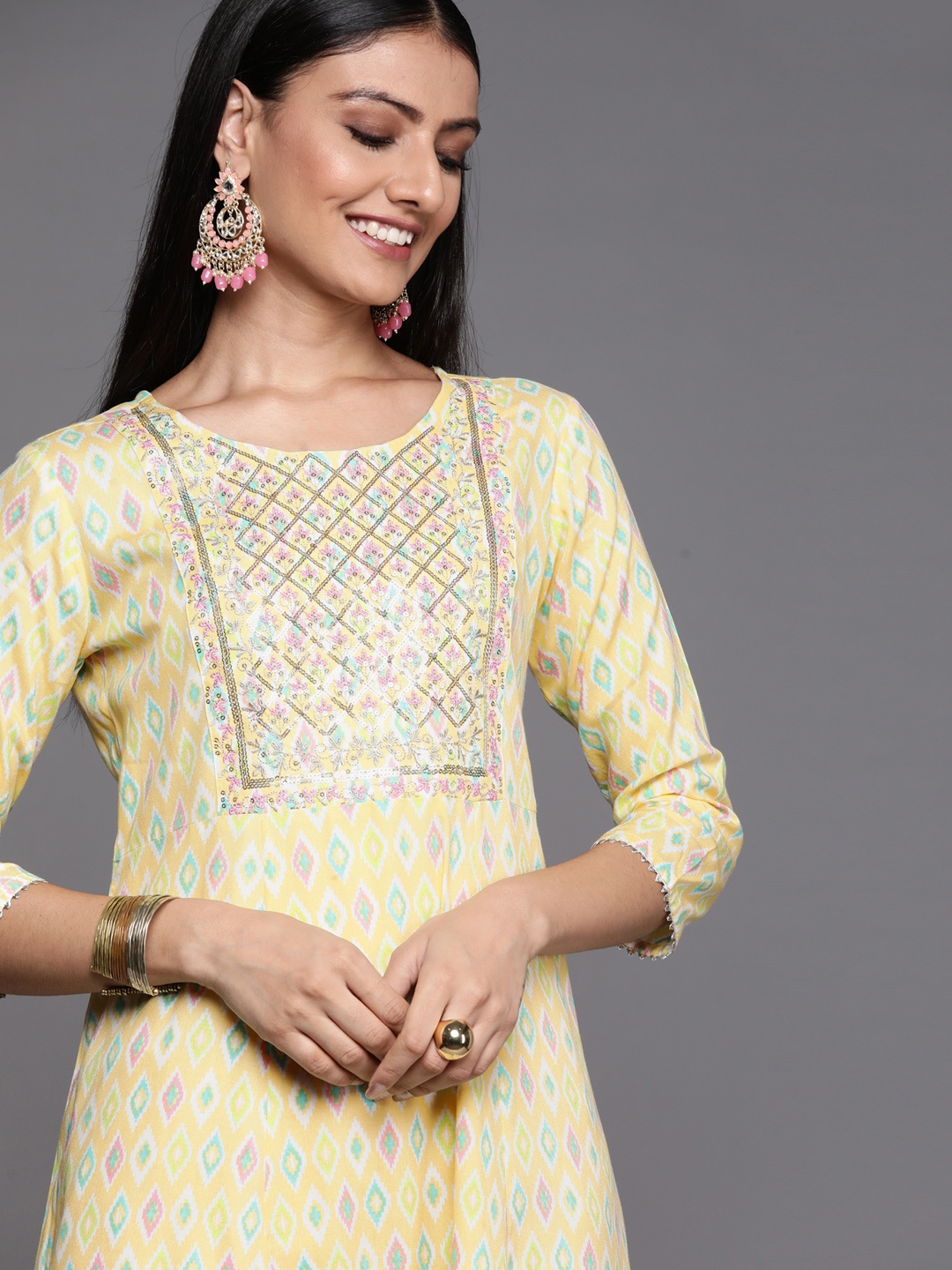 

Libas Women Yellow & White Sequinned Geometric Printed Kurta