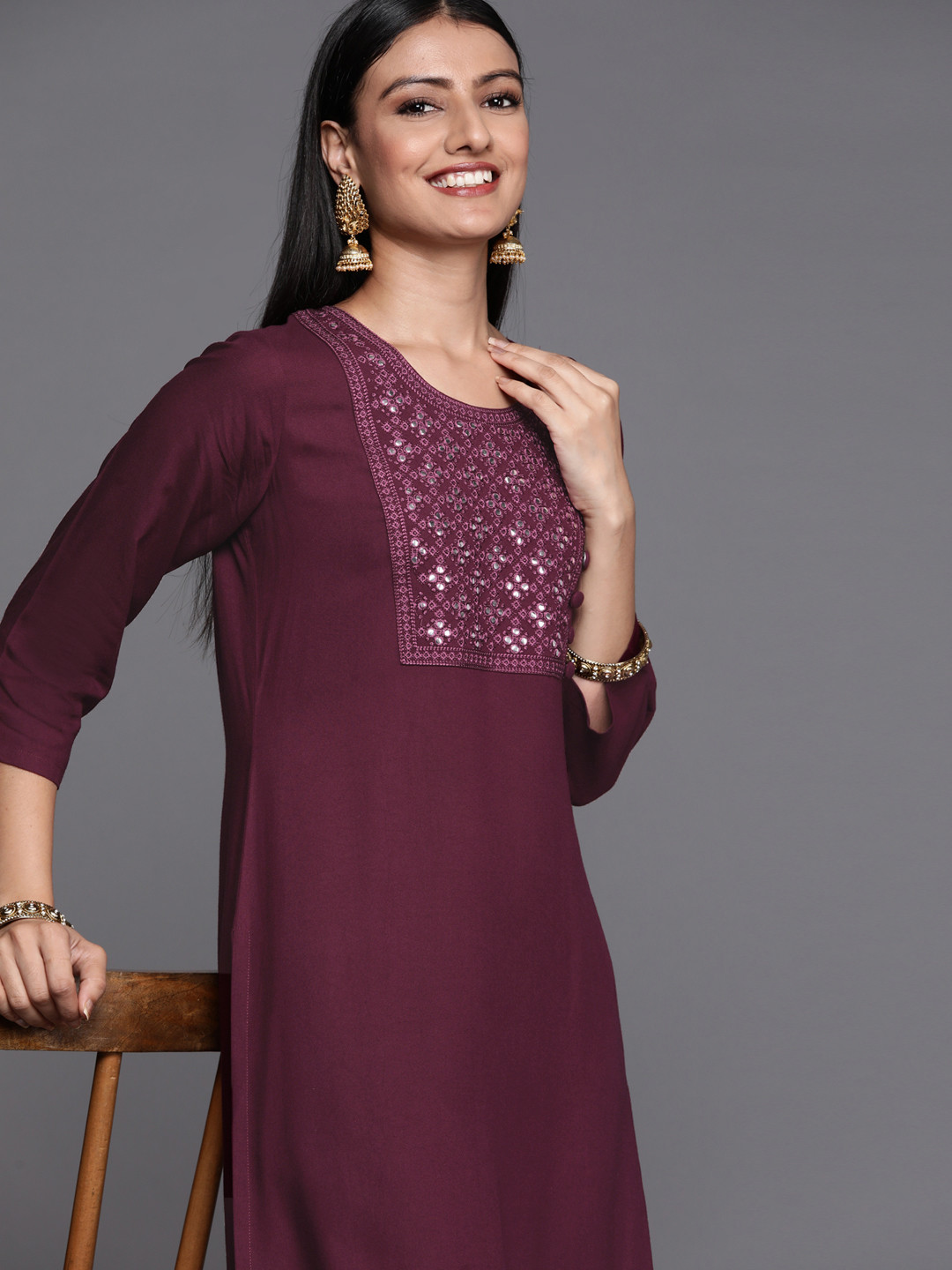 

Libas Women Burgundy Embroidered Mirror Work Kurta