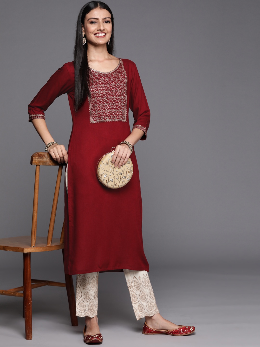 

Libas Women Maroon & Golden Ethnic Motifs Yoke Design Kurta