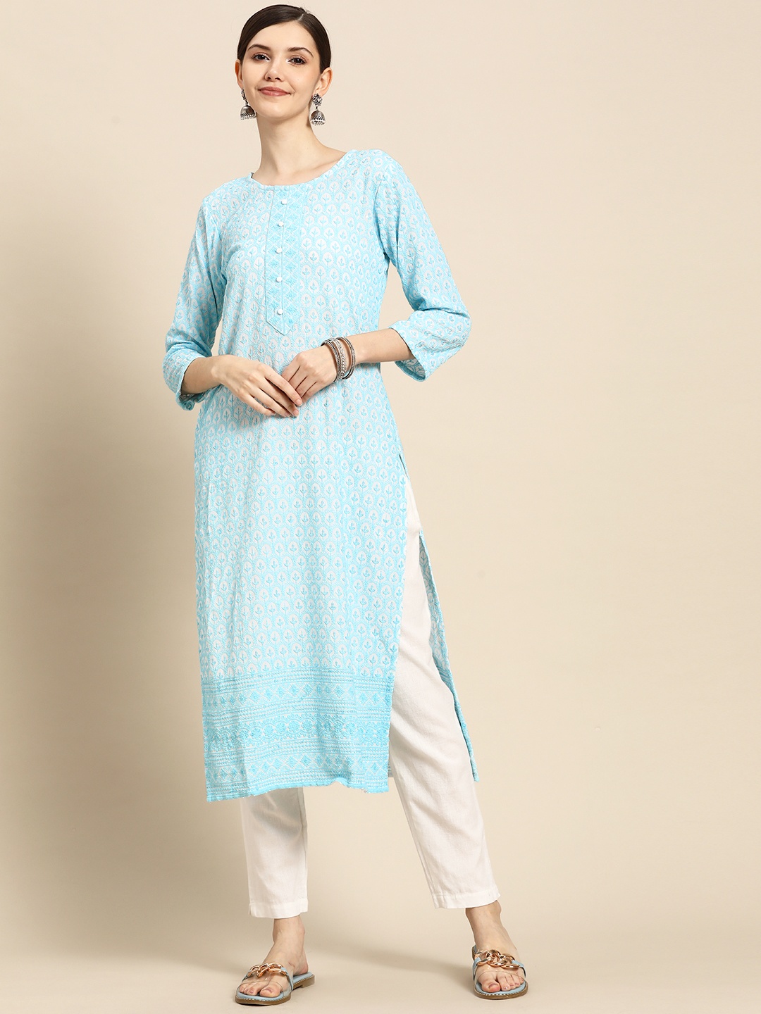 

Sangria Women Turquoise Blue & White Ethnic Motifs Embroidered Floral Kurta