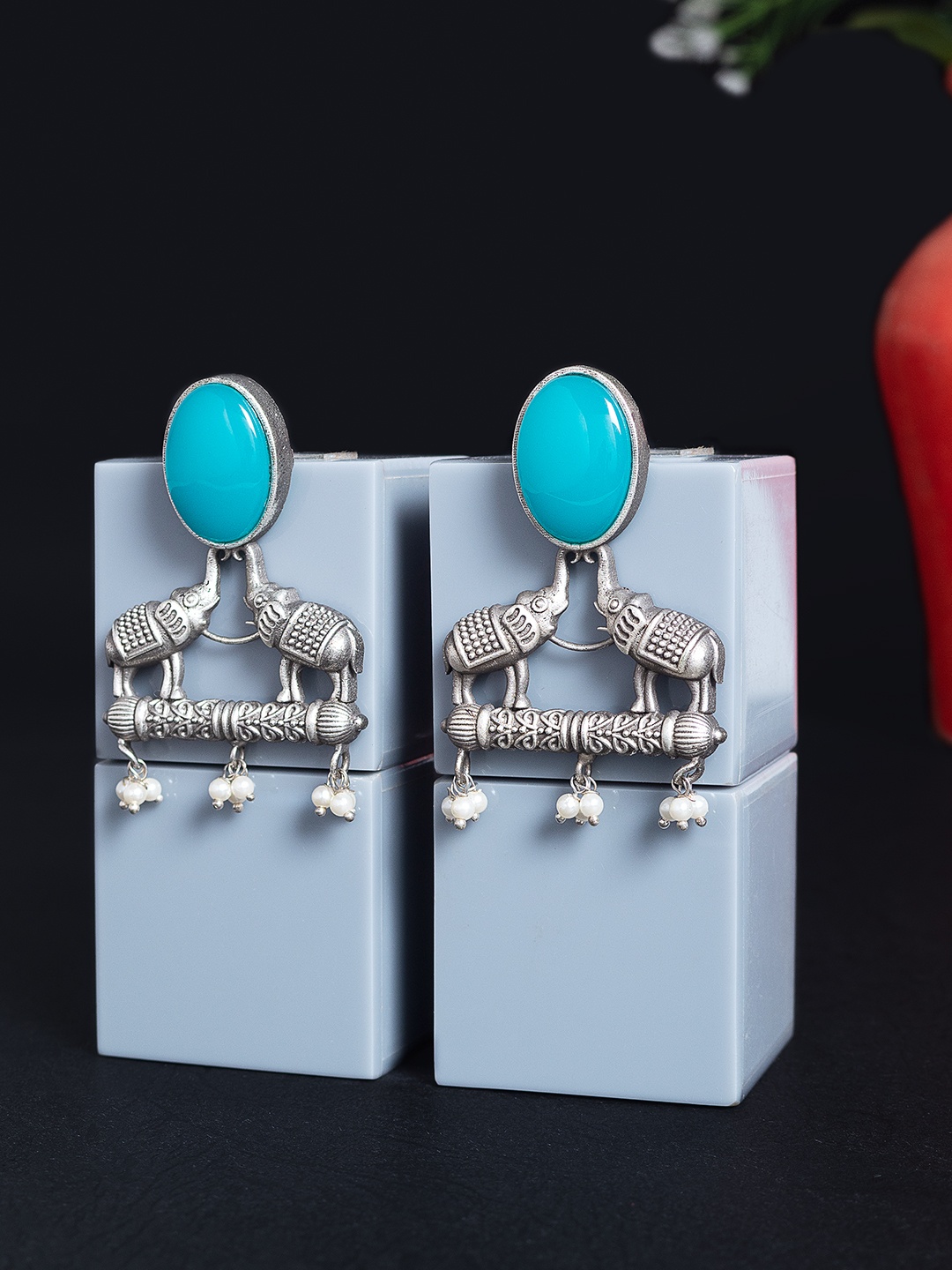 

Golden Peacock Blue & Oxidised Silver-Toned Studded Elephant Shaped Studs