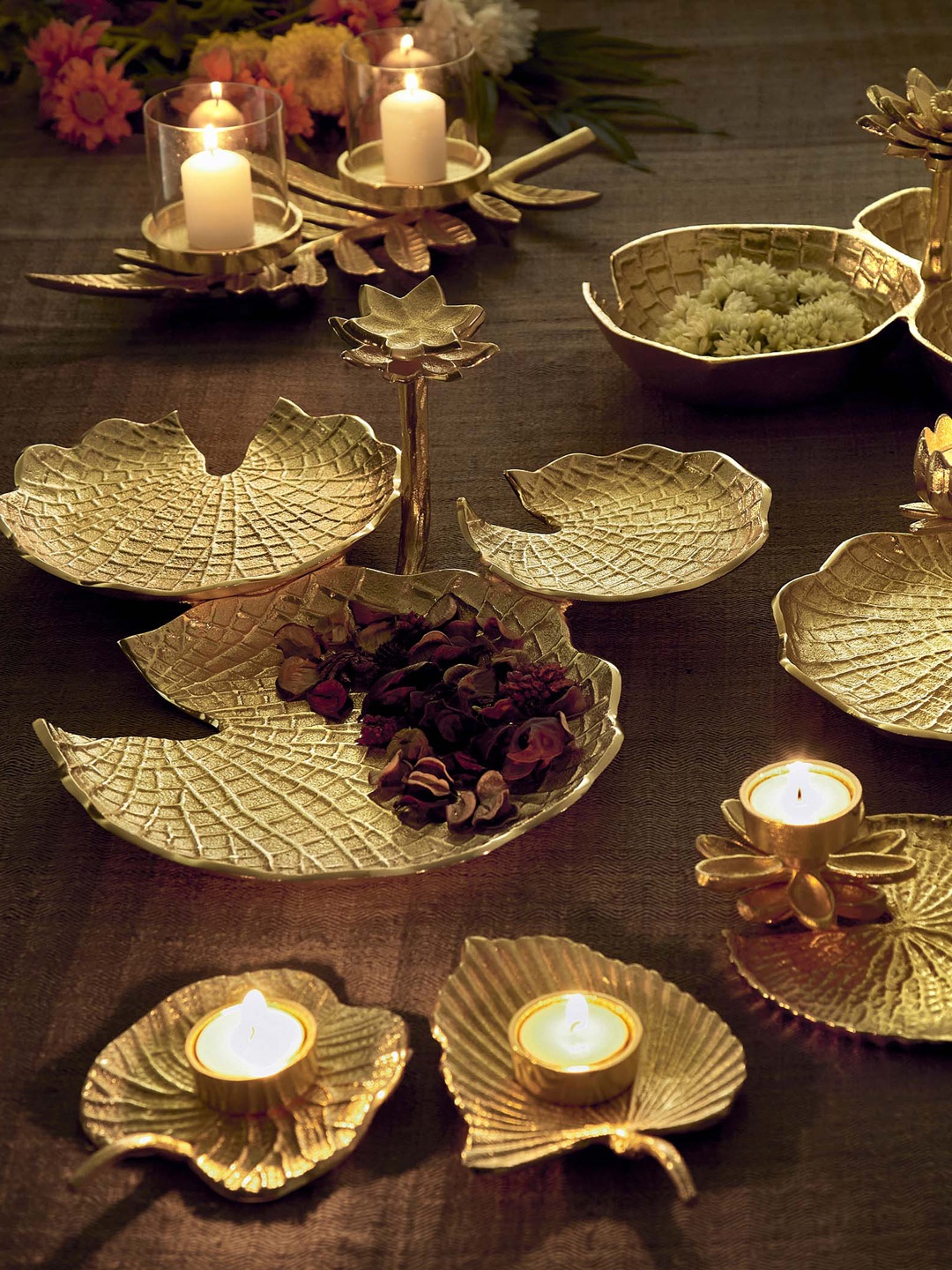 

Home Centre Gold-Toned Textured Lotus T-Light Holder With Platter