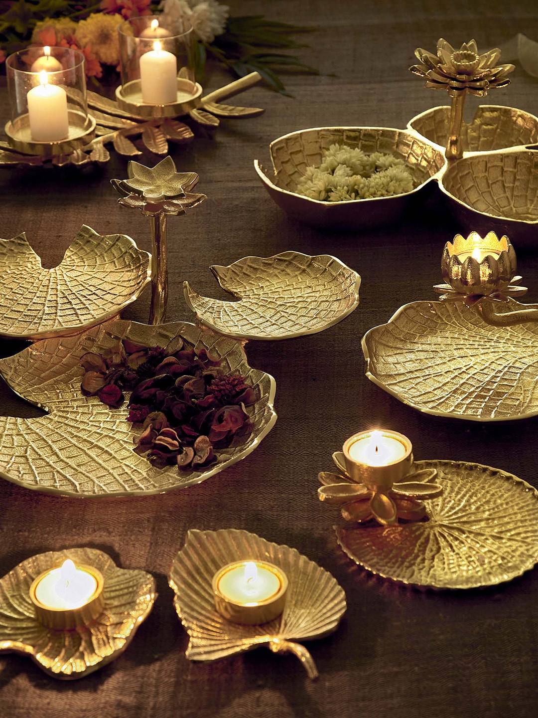 

Home Centre Set Of 2 Gold-Toned Majestic T-Light Holder with Leaf Stand