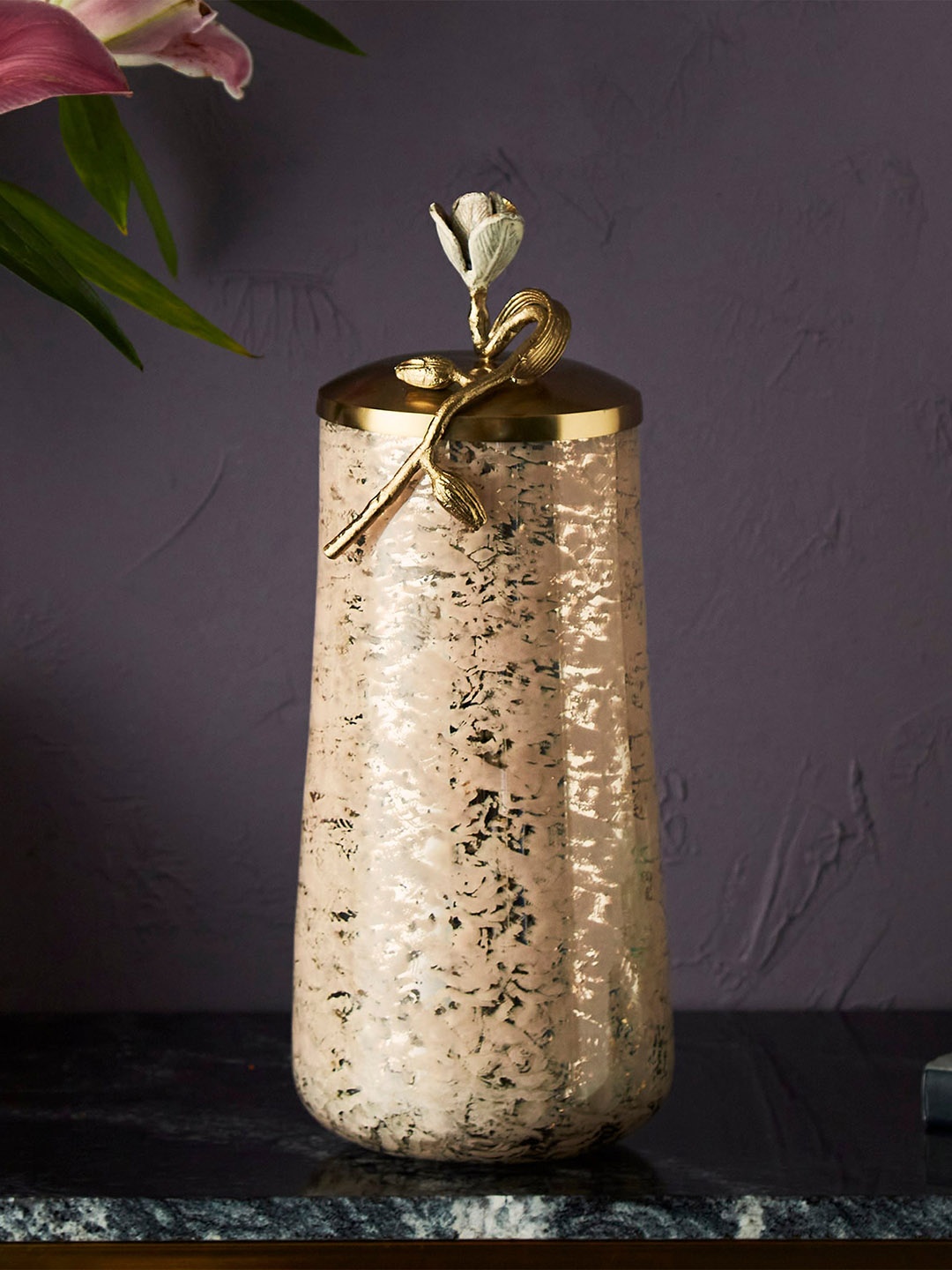 

Home Centre Gold-Toned Textured Glass Canister With Lid Showpieces