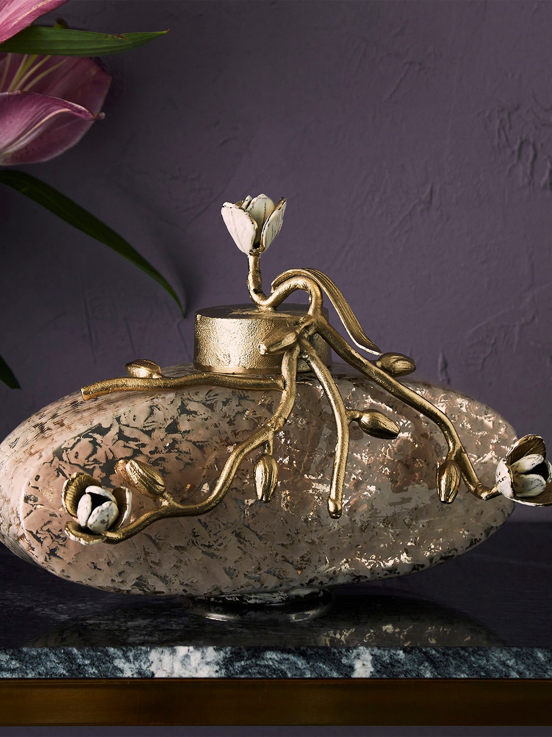 

Home Centre Gold-Toned Textured Glass Oval Floor Canister With Floral Lid