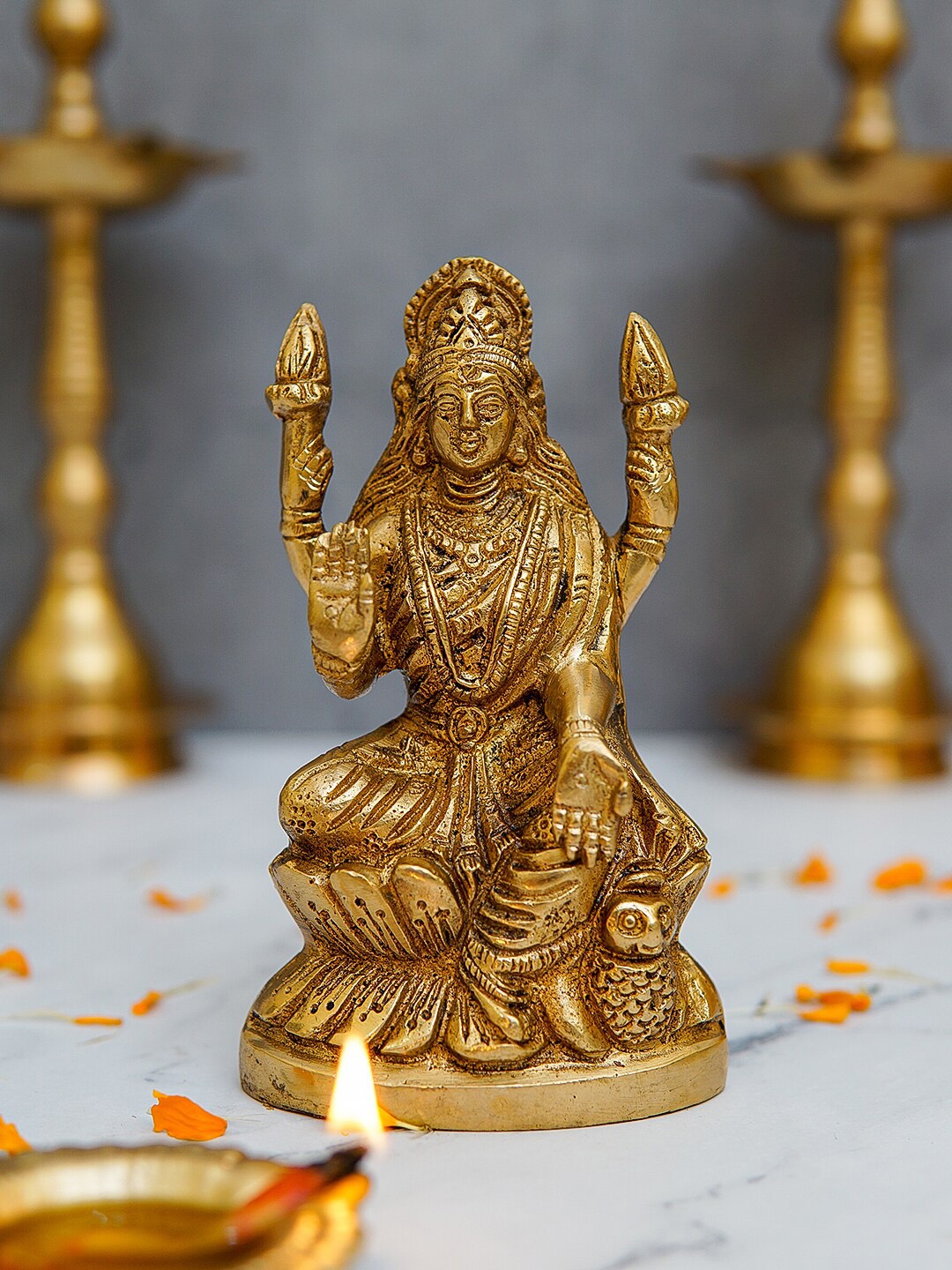 

StatueStudio Gold-Toned Lakshmi Idol Decorative Showpieces