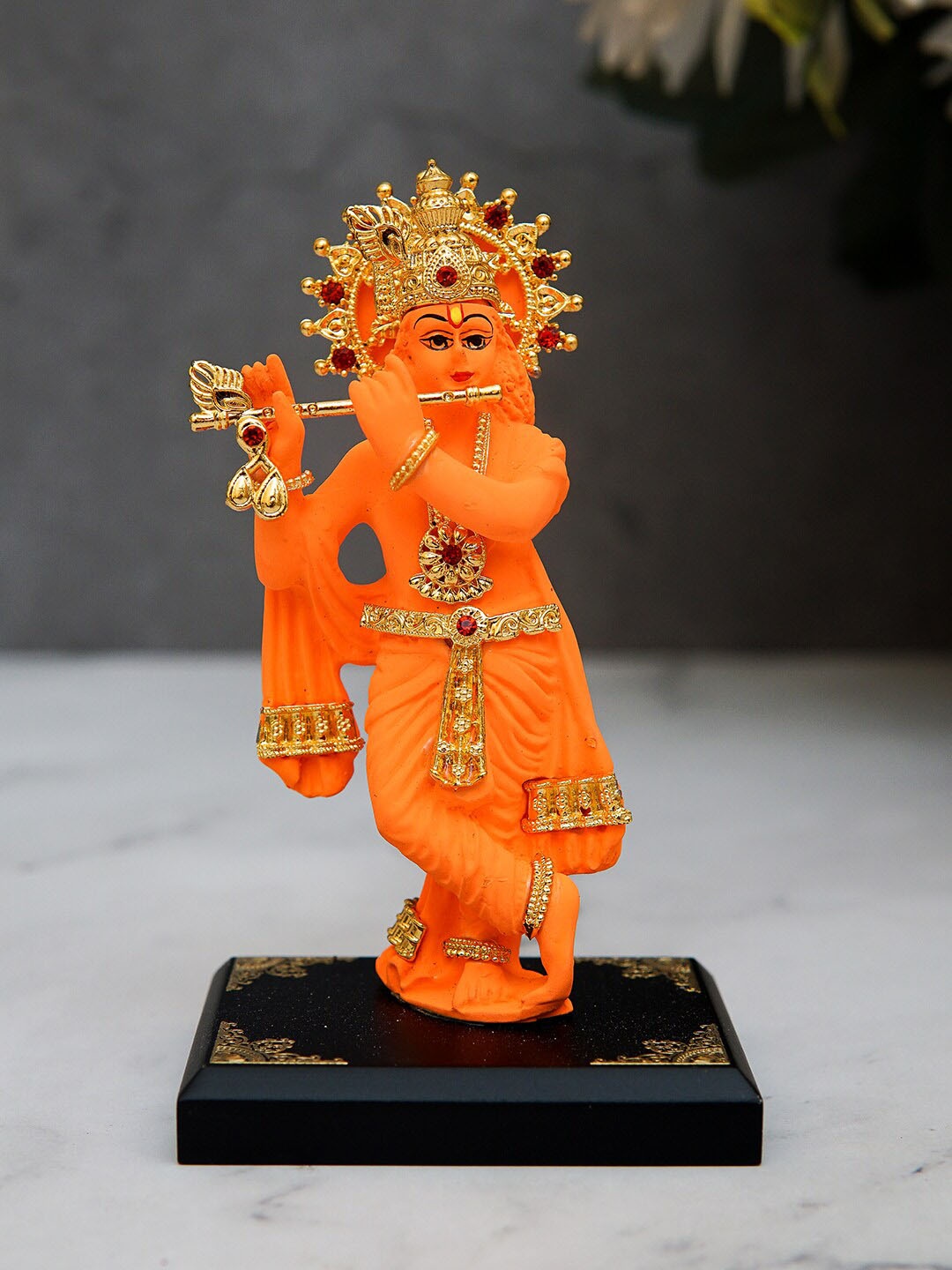 

StatueStudio Orange & Gold-Toned Krishna Showpieces