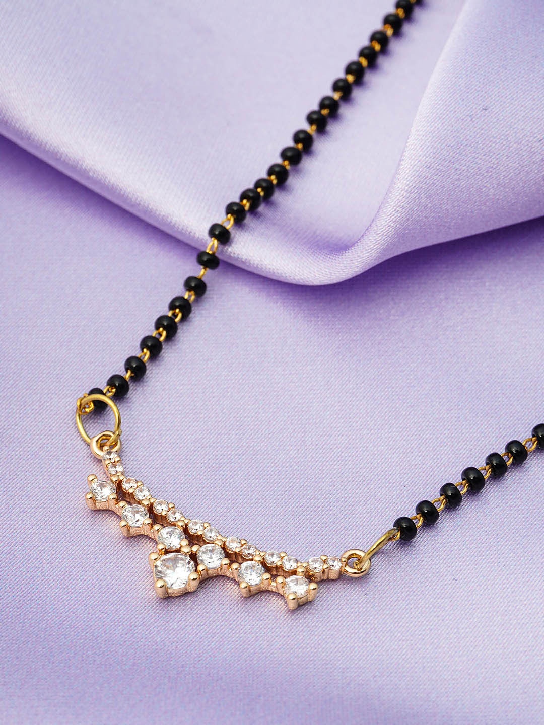 

Ferosh Black And Gold Toned Gold-Plated Rhinestone Studded Pendant Mangalsutra