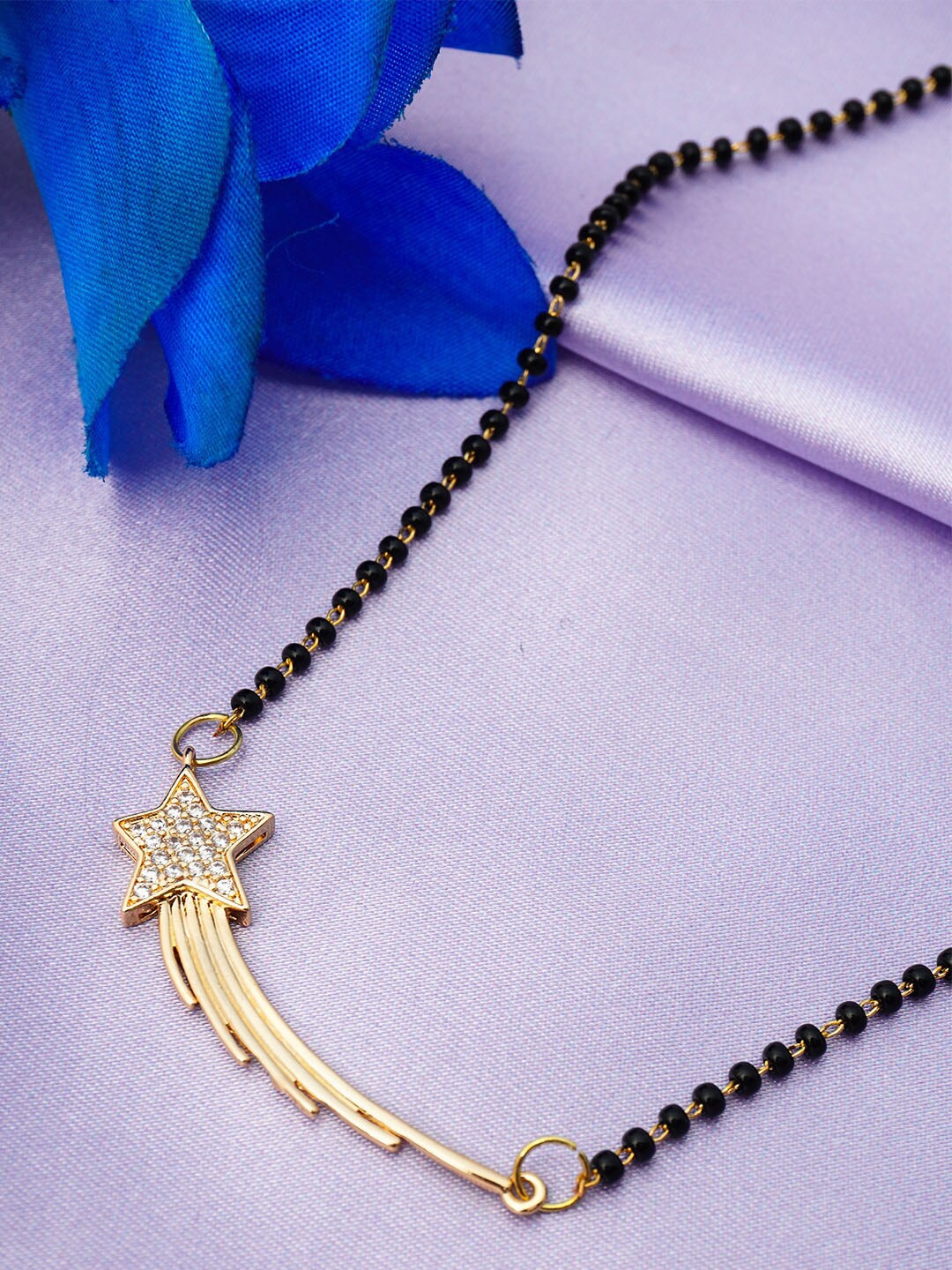 

Ferosh Black And Gold Toned Gold-Plated Shooting Star Pendant Beaded Mangalsutra