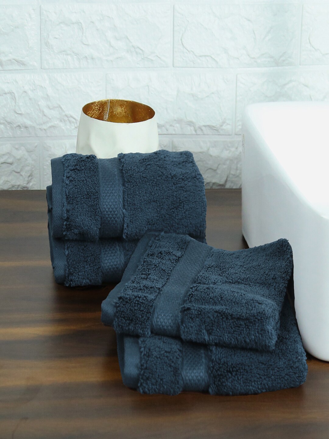 

MYTRIDENT Set Of 4 Navy Blue Solid 575 GSM Cotton Face Towels