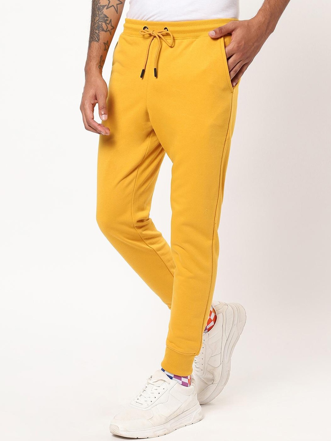

Bewakoof Men Yellow Solid Joggers