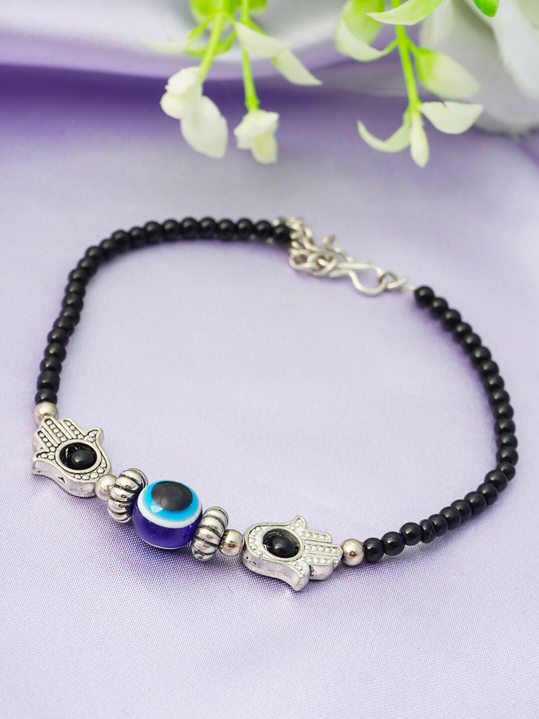 

Urmika Women Silver-Toned Silver Hamsa Hand Black Beaded Evil Eye Anklet