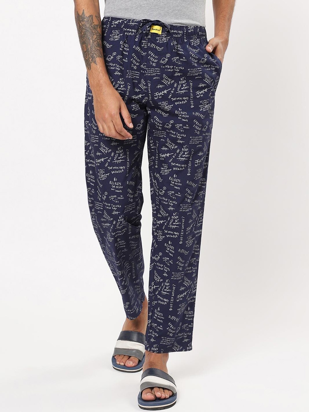 

Bewakoof Men Blue Typography Printed Cotton Lounge Pants