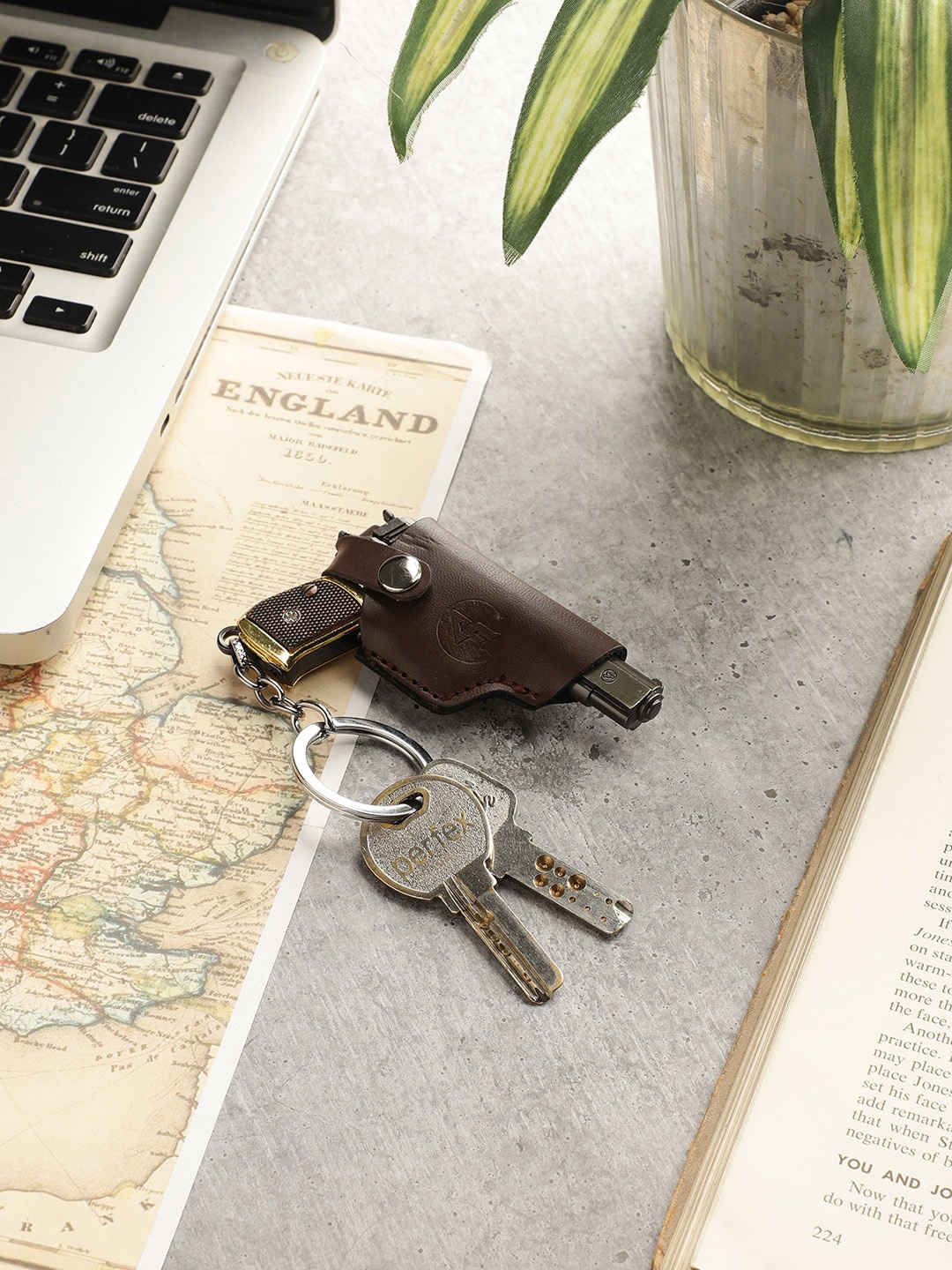 

EXIM DECOR Brown Solid Metal Gun Keychain With Leather Cover