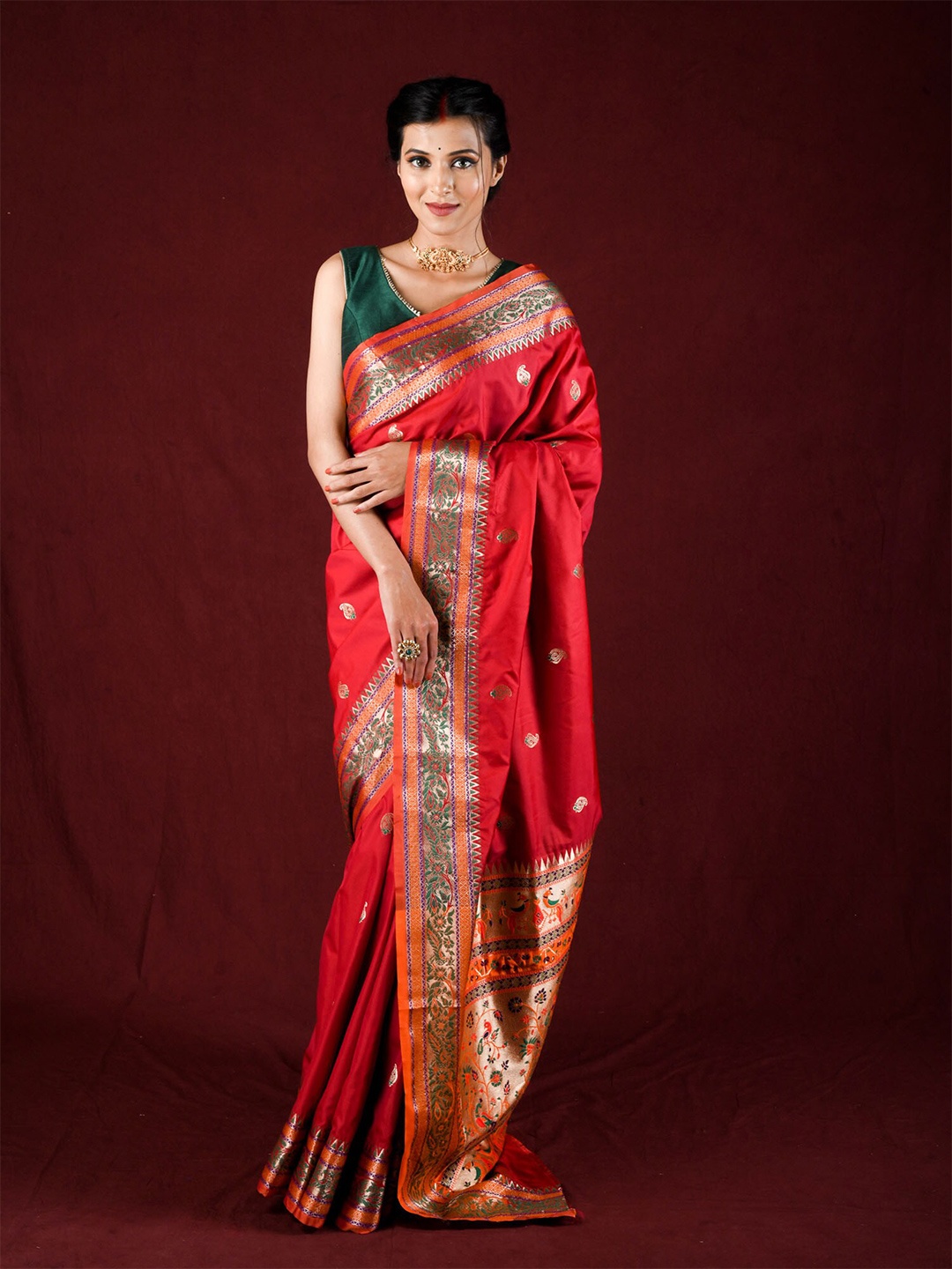 

Exclusiva Red & Green Woven Design Zari Silk Blend Saree