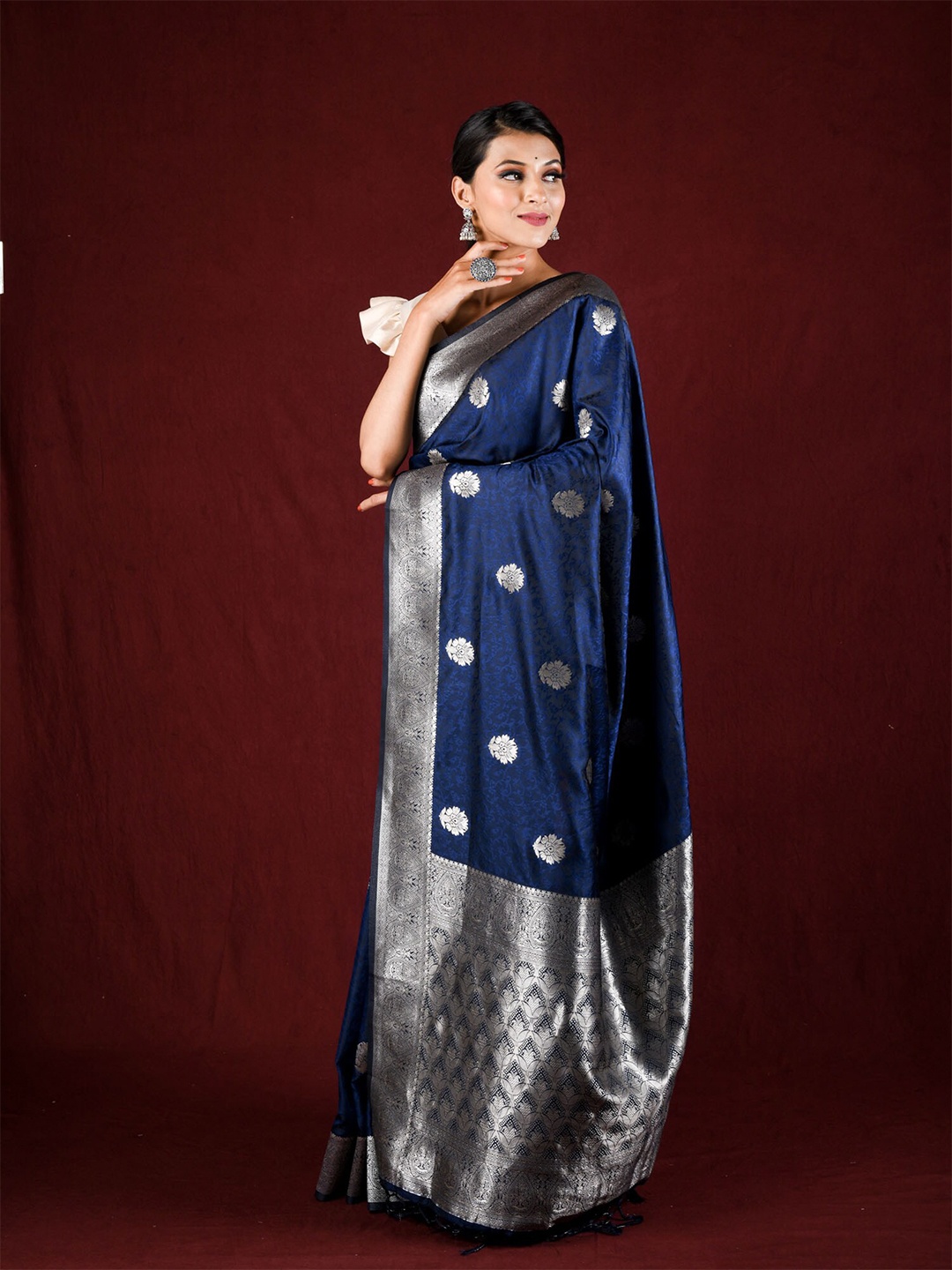 

Exclusiva Blue & Silver-Toned Ethnic Motifs Zari Saree
