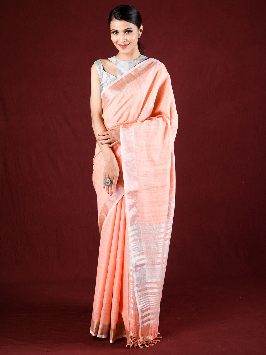 

Exclusiva Orange & Silver-Toned Zari Linen Saree