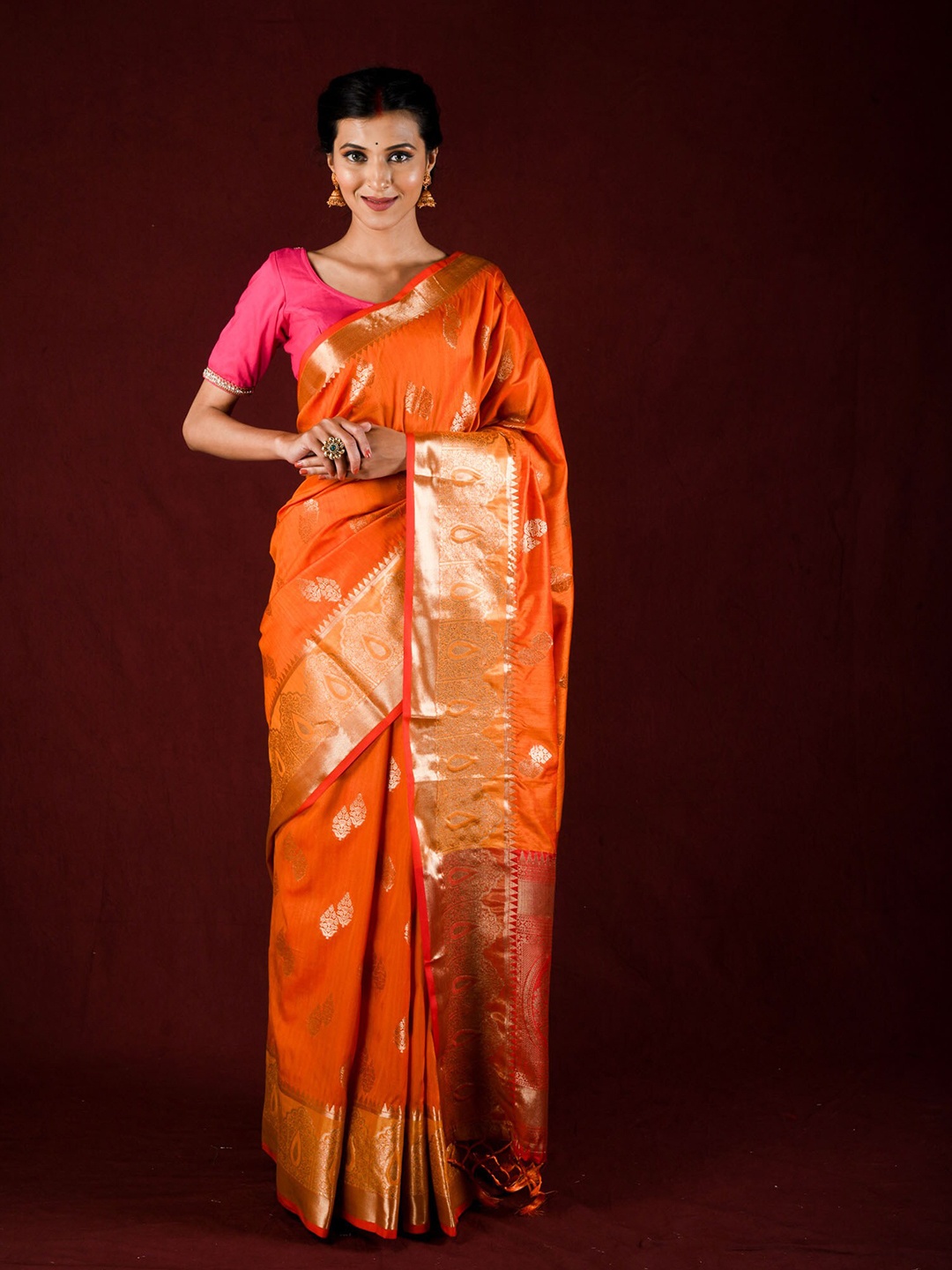 

Exclusiva Orange & Gold-Toned Ethnic Motifs Zari Saree