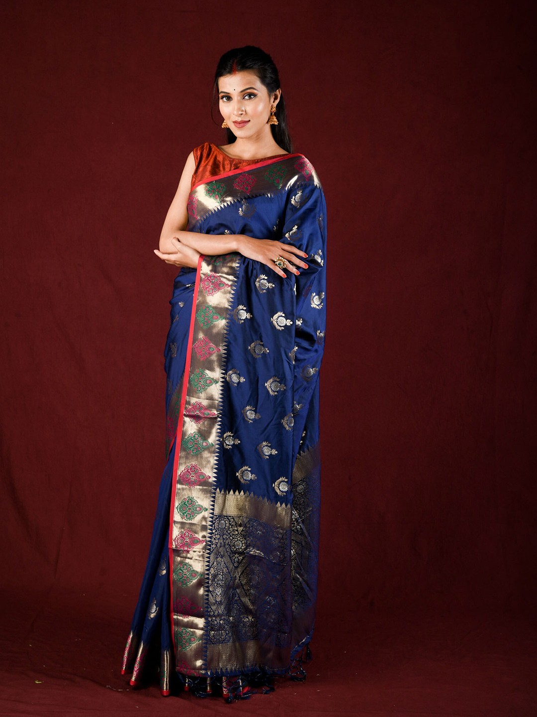 

Exclusiva Blue & Red Woven Design Zari Silk Blend Banarasi Saree