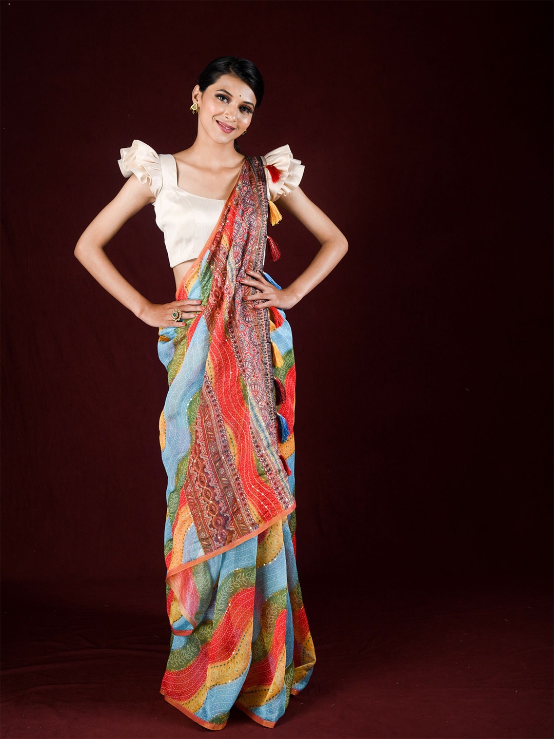 

Exclusiva Blue & Green Leheriya Sequinned Silk Cotton Leheriya Saree