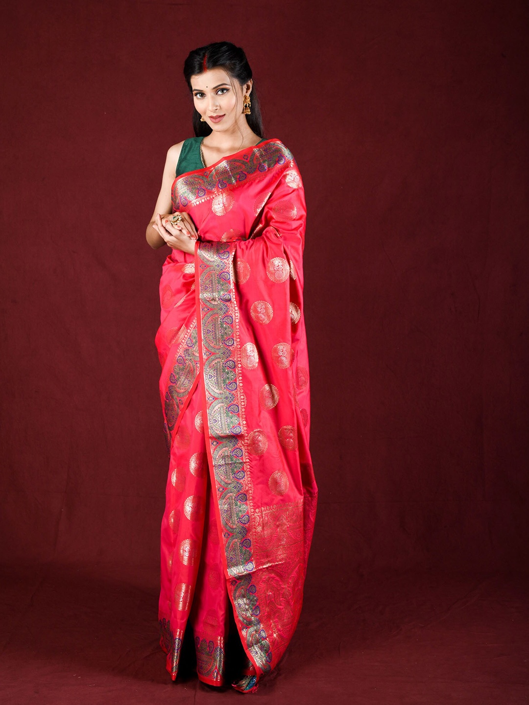 

Exclusiva Pink & Green Woven Design Zari Silk Blend Saree