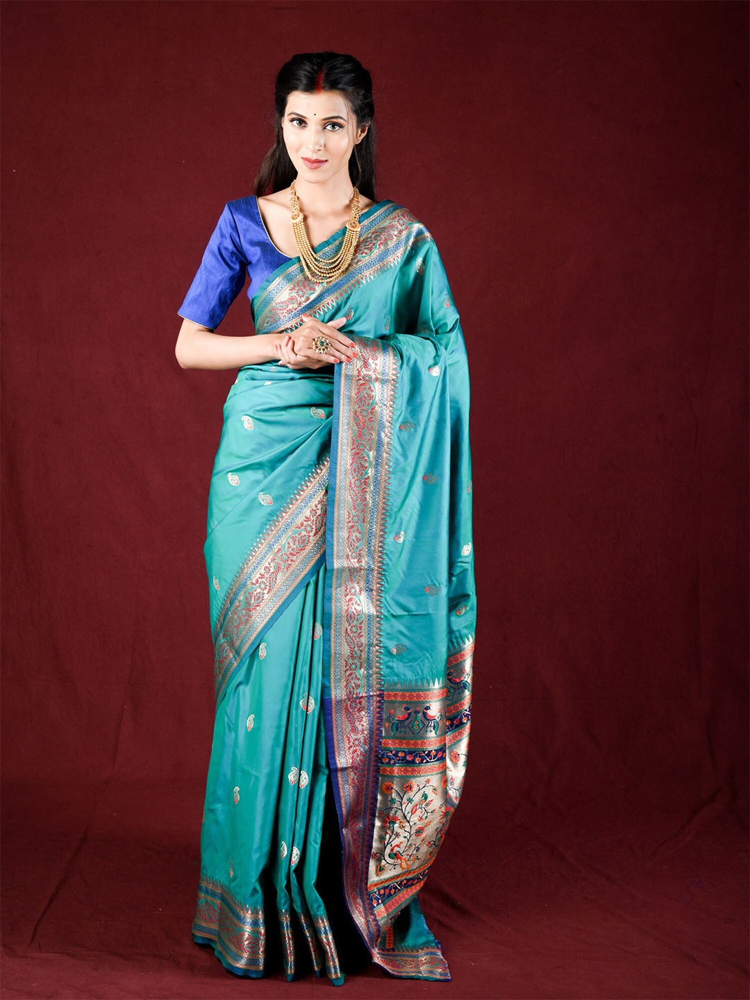 

Exclusiva Blue & Gold-Toned Woven Design Zari Silk Blend Saree