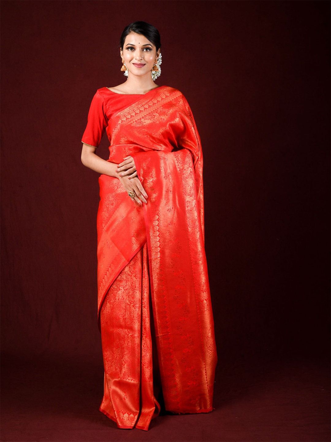 

Exclusiva Red Ethnic Motifs Zari Silk Blend Banarasi Saree