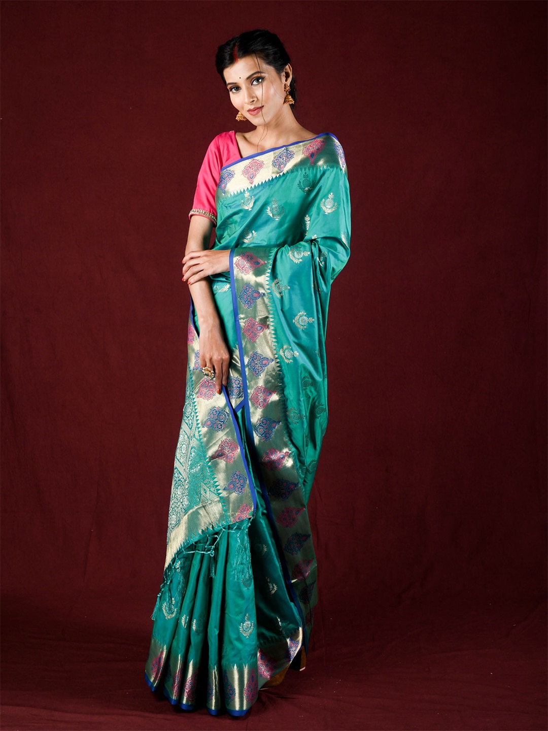

Exclusiva Green & Pink Ethnic Motifs Zari Silk Blend Saree