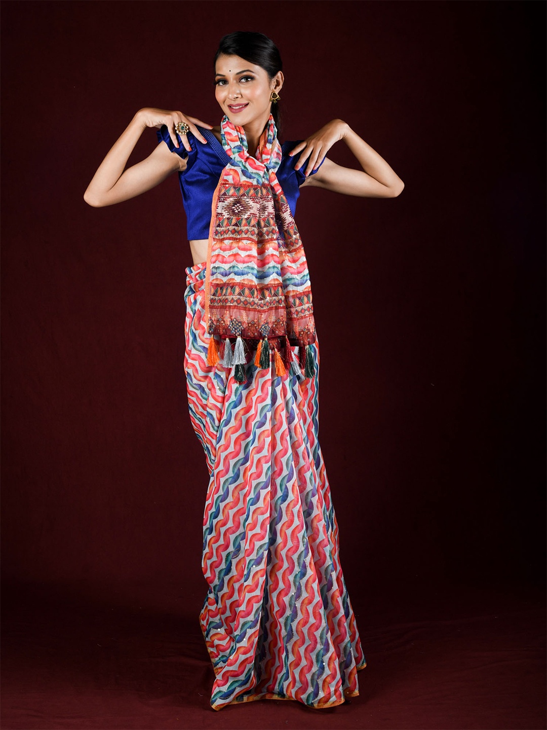 

Exclusiva Red & Blue Silk Cotton Leheriya Saree
