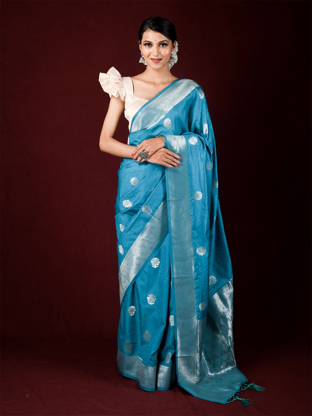 

Exclusiva Blue & Silver-Toned Ethnic Motifs Zari Silk Blend Banarasi Saree