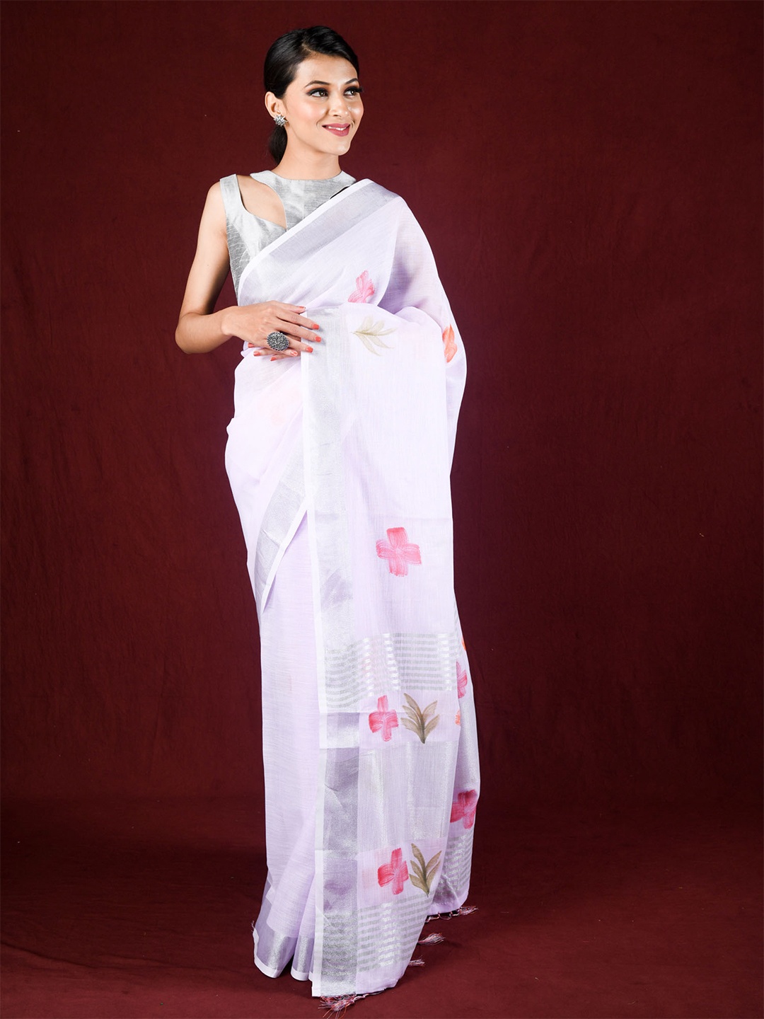 

Exclusiva Lavender & Pink Floral Zari Linen Blend Saree