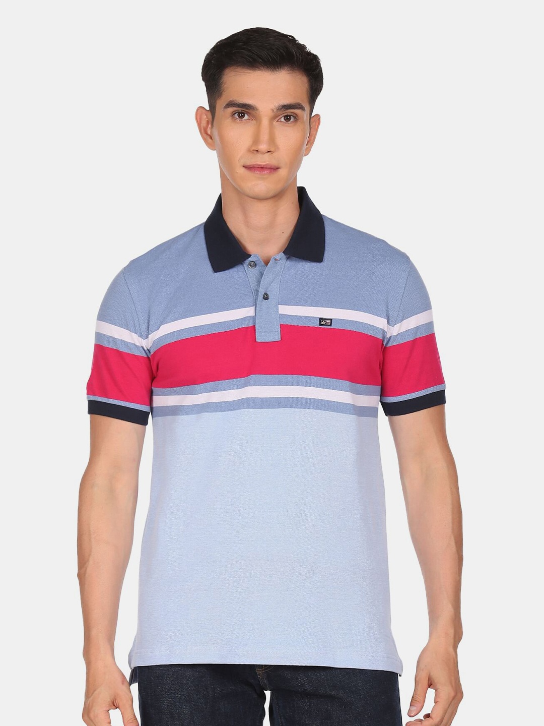 

Arrow Sport Men Blue & Pink Printed Colourblocked Polo Collar T-shirt