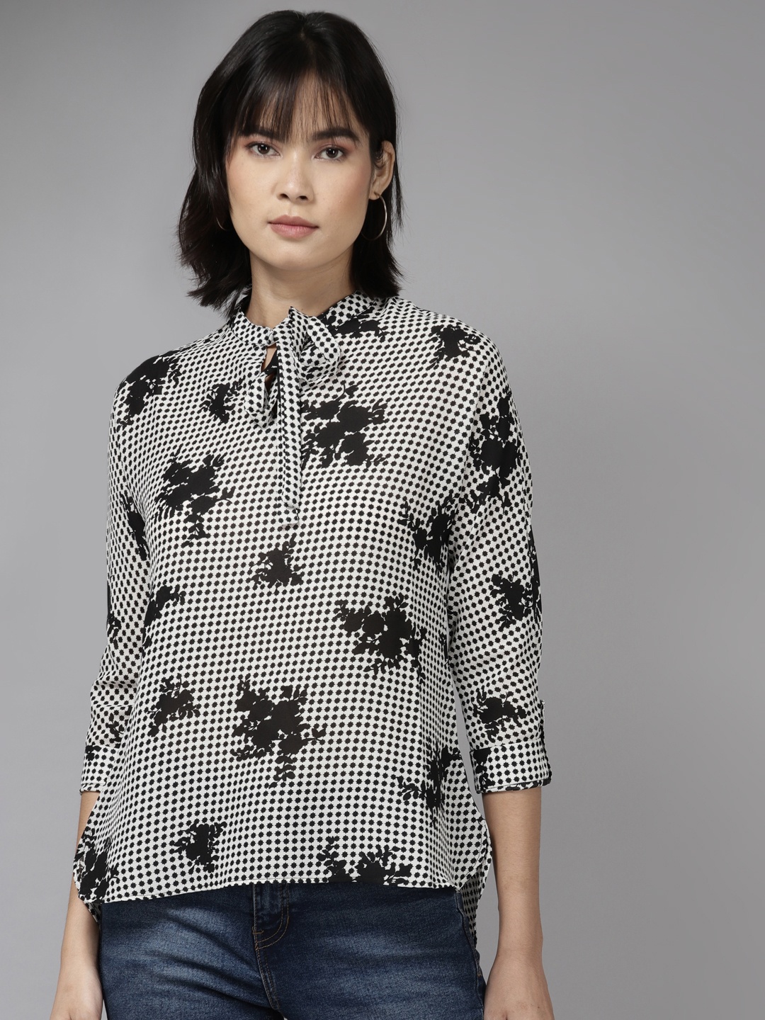 

Aarika White & Black Floral Print Tie-Up Neck Top