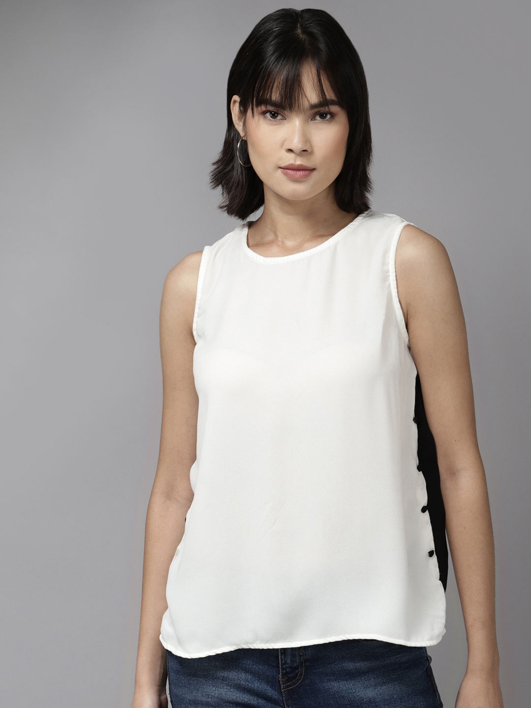 

Aarika Off White Sleeveless Top