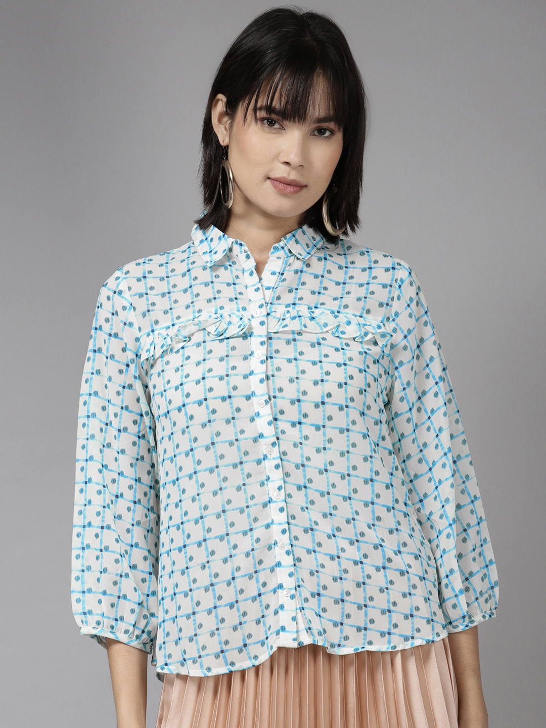 

Aarika Cream-Coloured & Turquoise Blue Geometric Print Ruffles Shirt Style Top