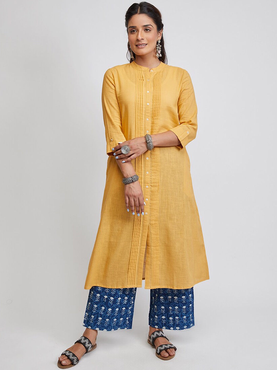 

EK BY EKTA KAPOOR Women Yellow Solid Cotton A-Line Kurta With Pintucks, Beige