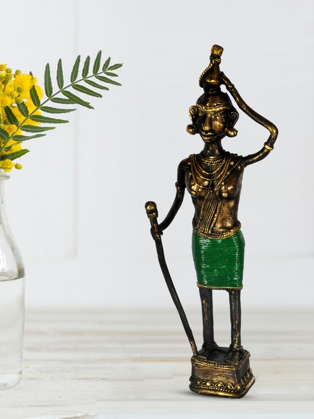 

SHREE KALA HOME DECOR Bronze-Toned & Green Tribal Lady With Stick Showpieces