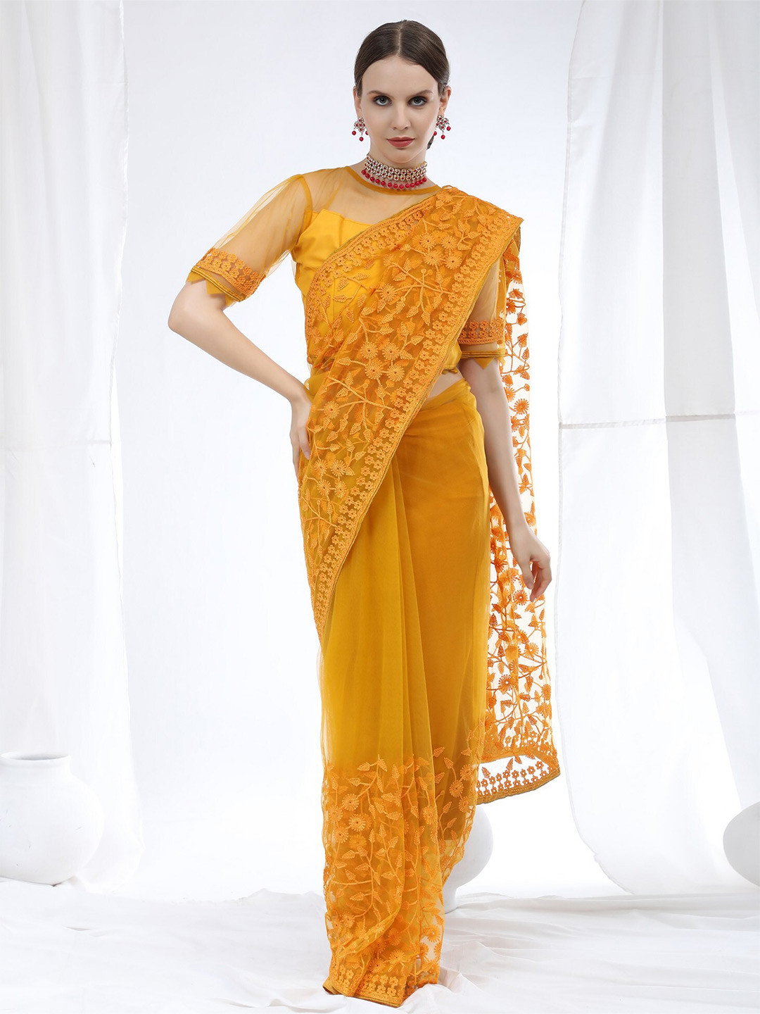 

ORUS Mustard Floral Embroidered Net Heavy Work Saree