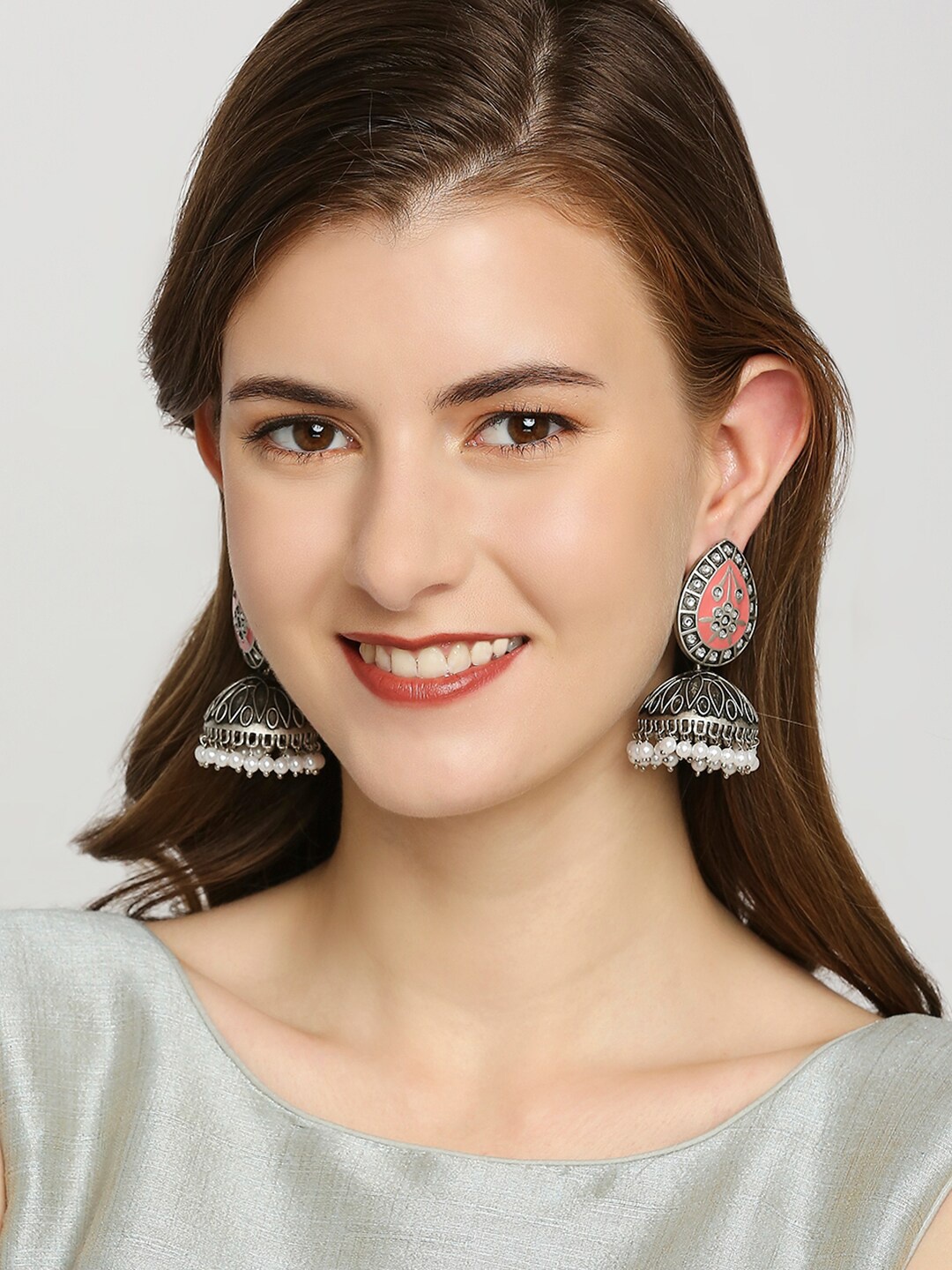 

OOMPH Pink & Silver Plated Dome Shaped Oxidised Jhumkas Earrings