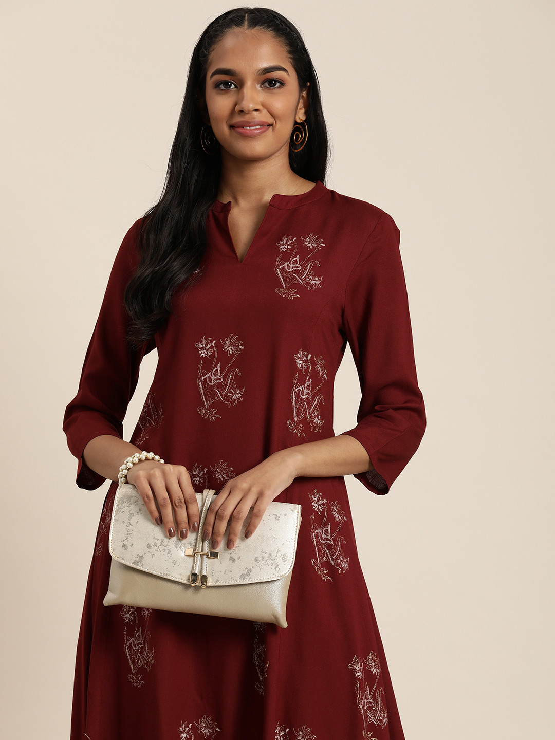 

Taavi Women Festive Floral Printed Floral Kurta, Maroon