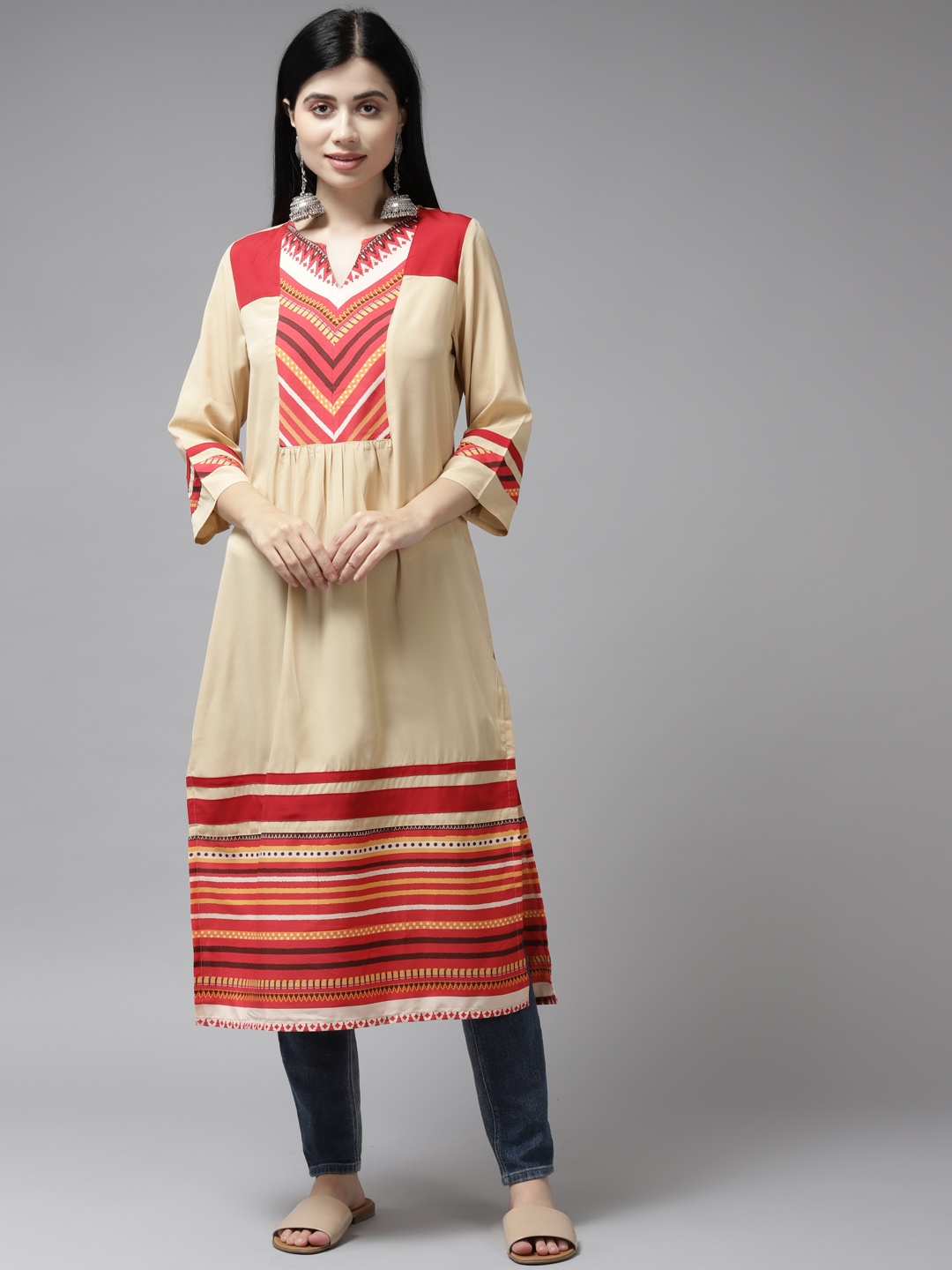 

Aarika Women Beige & Red Printed Georgette Kurta