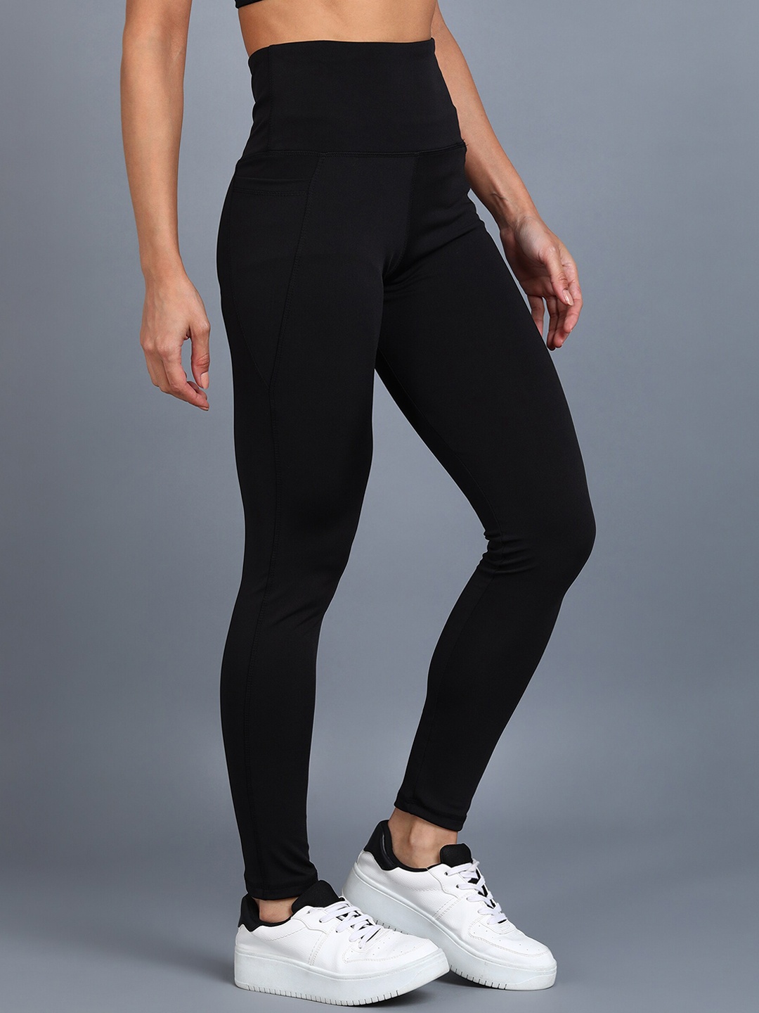 

Rock Paper Scissors Women Black Solid Ankle Length Training Tights