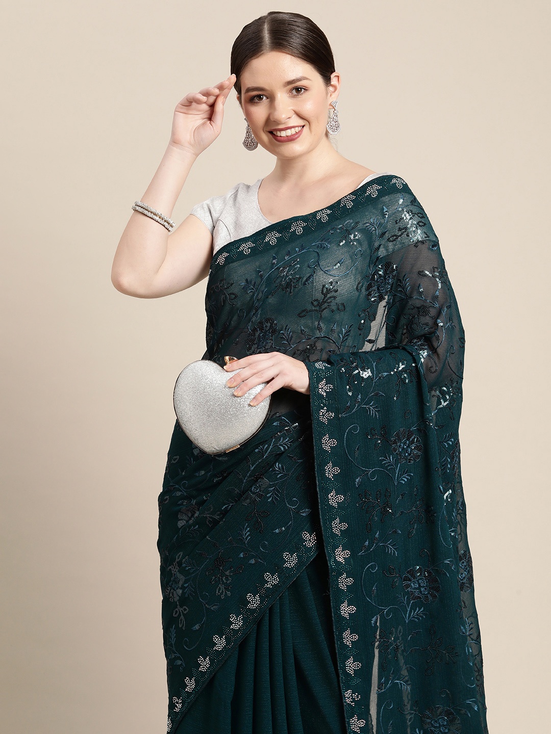 

Pothys Teal Ethnic Motifs Sequinned Pure Chiffon Saree